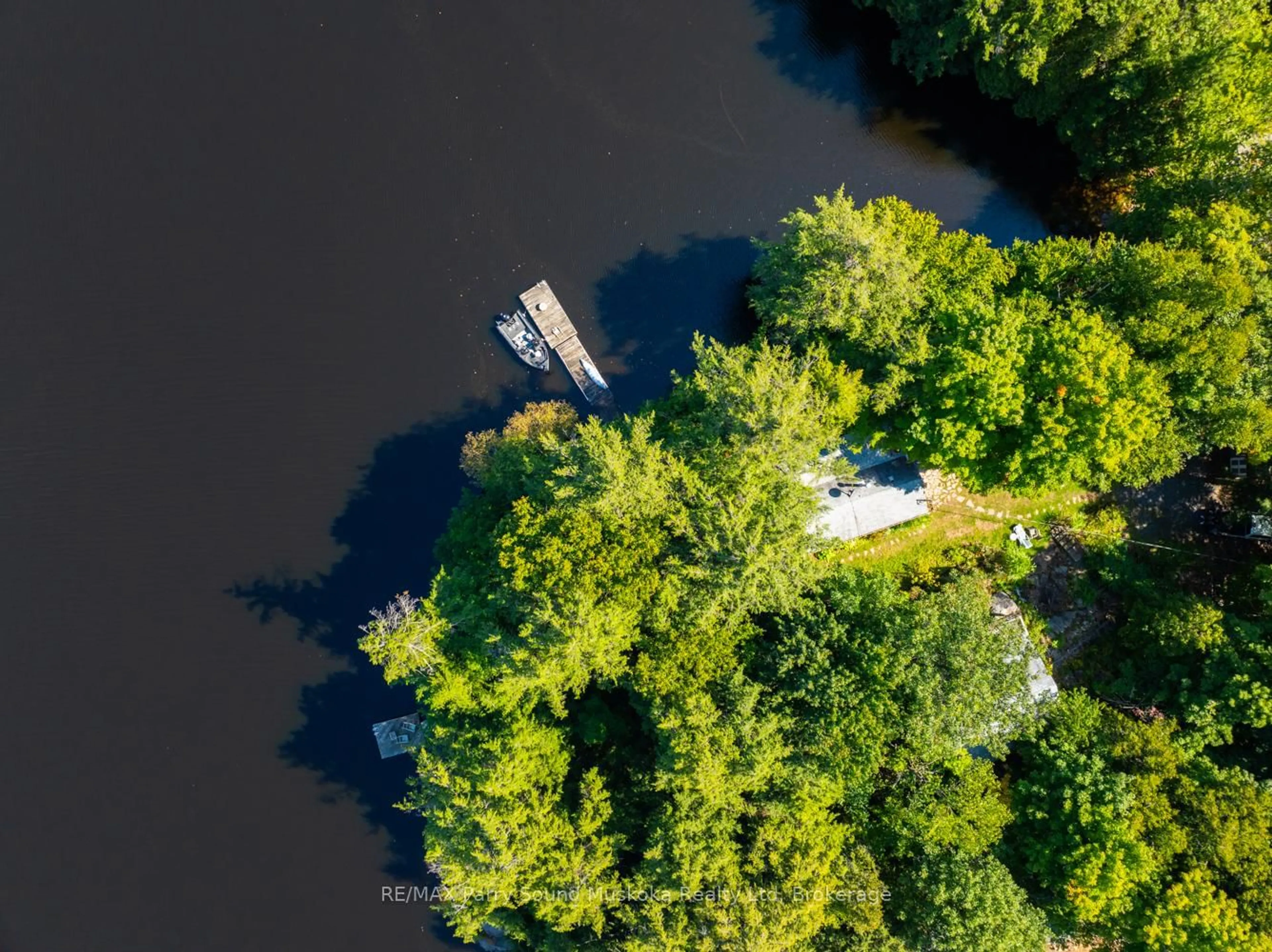 A pic from outside/outdoor area/front of a property/back of a property/a pic from drone, water/lake/river/ocean view for 58 DEERFIELD Rd, McKellar Ontario P2A 0B4
