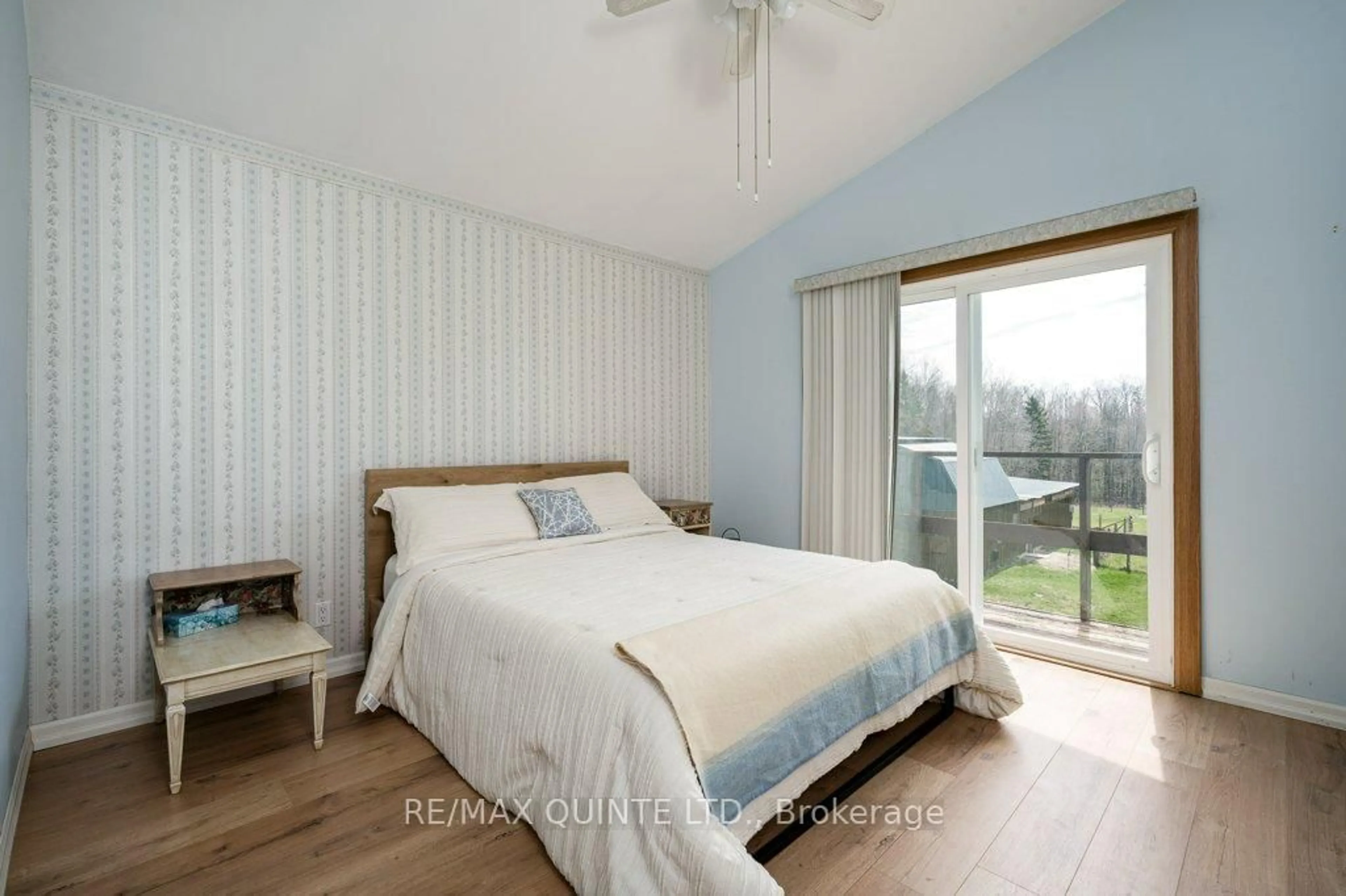 Bedroom with bed, wood/laminate floor for 252 Maines Rd, Thomasburg Ontario K0K 3H0