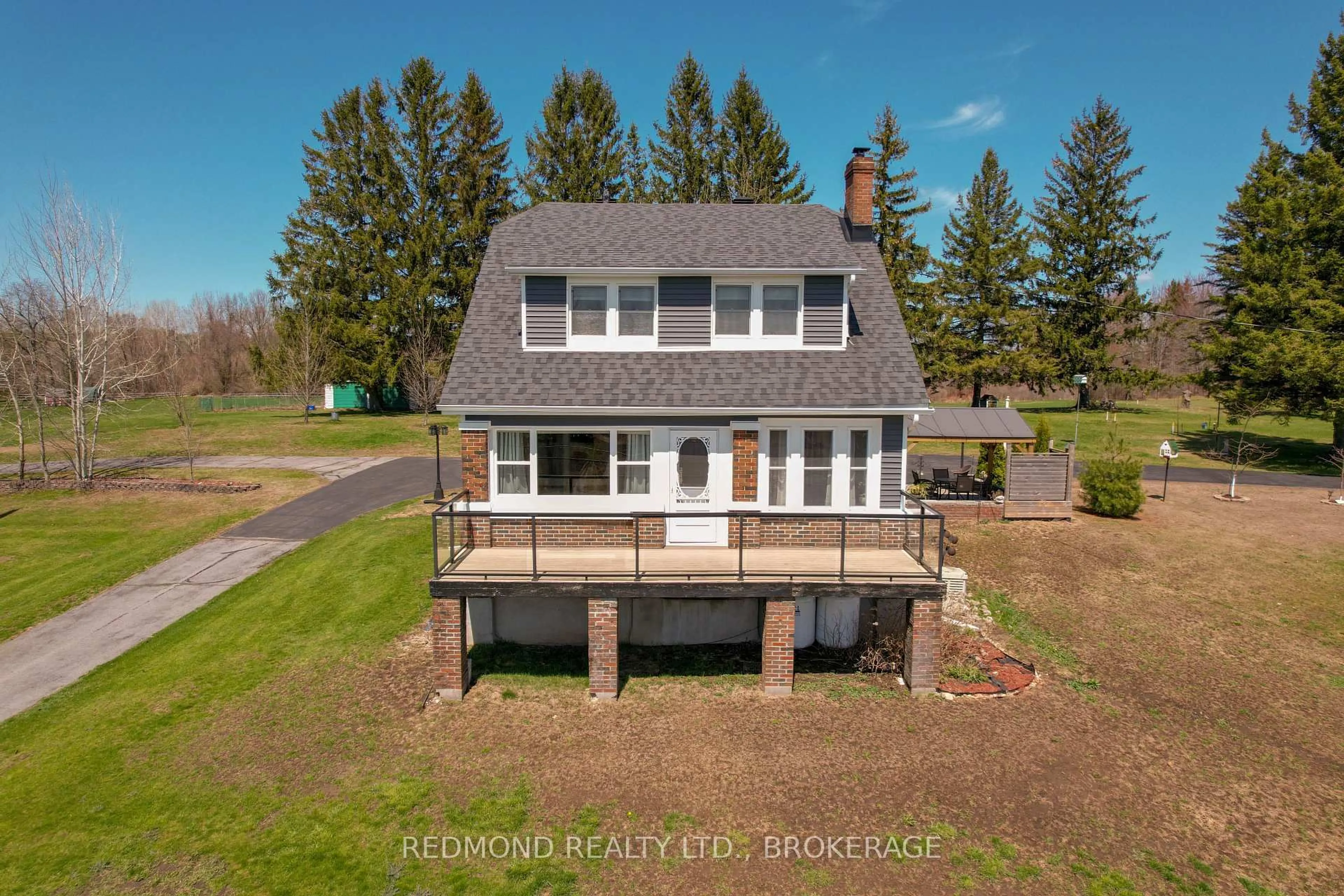 A pic from outside/outdoor area/front of a property/back of a property/a pic from drone, water/lake/river/ocean view for 4682 County Road 2 Rd, Front of Leeds & Seeleys Bay Ontario K7G 2V5