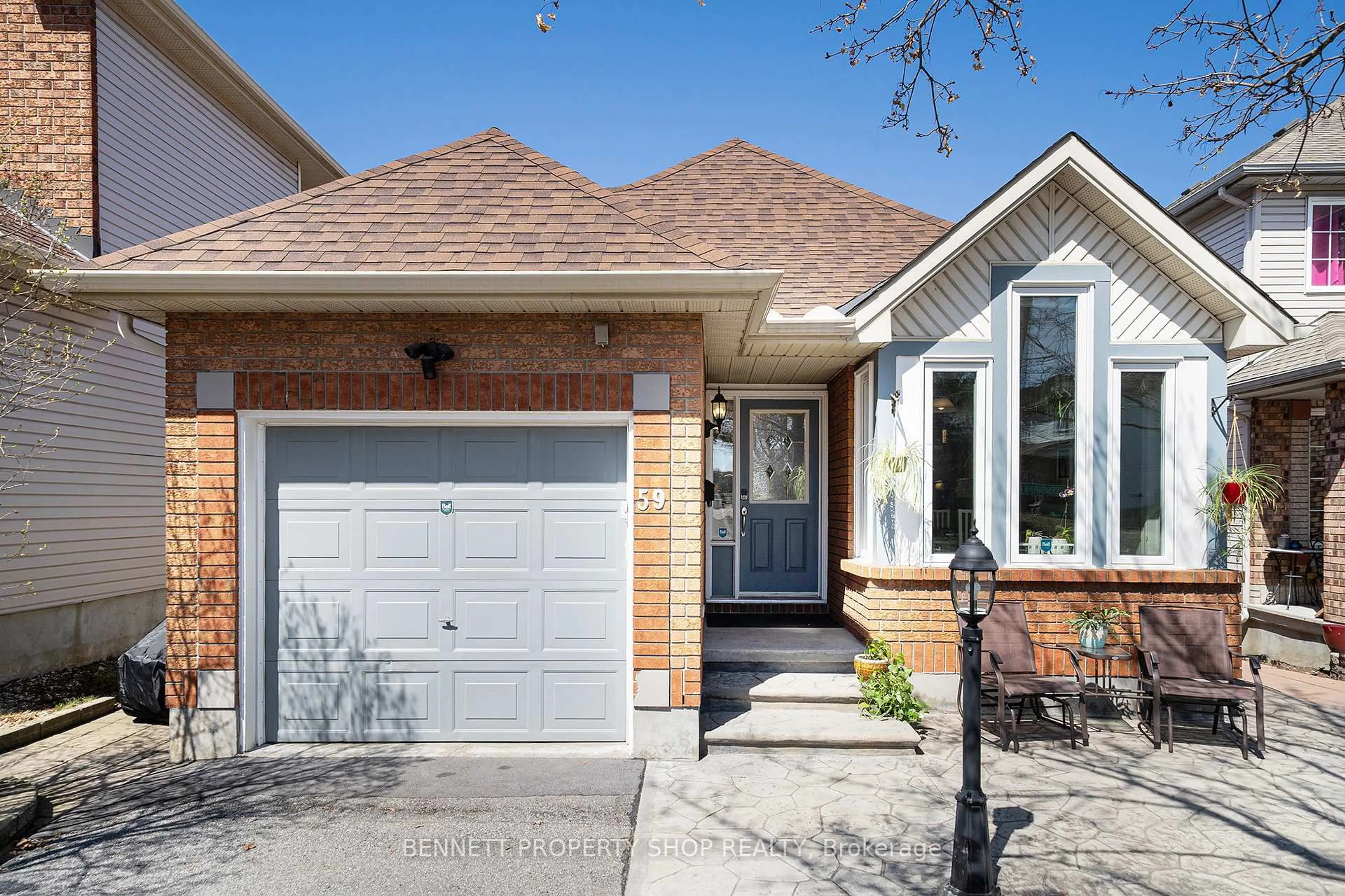 Home with brick exterior material, street for 59 Queensbury Dr, Nepean Ontario K2J 4L7