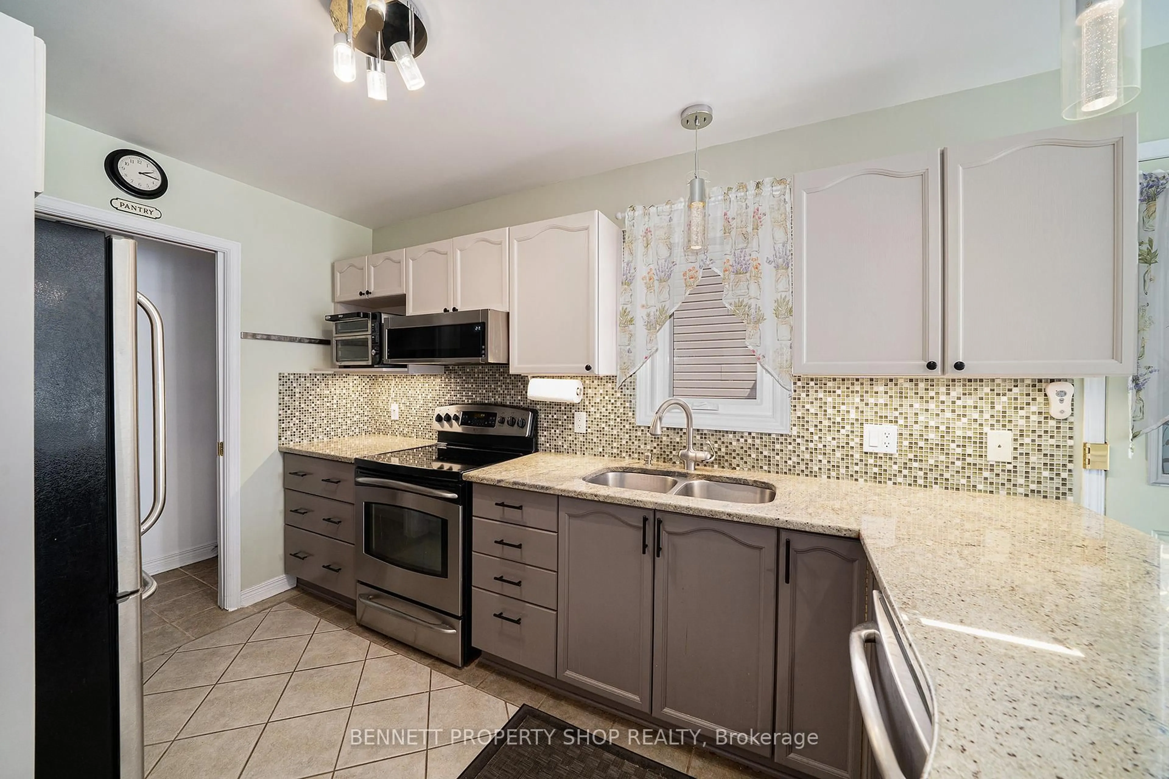 Open concept kitchen, ceramic/tile floor for 59 Queensbury Dr, Nepean Ontario K2J 4L7