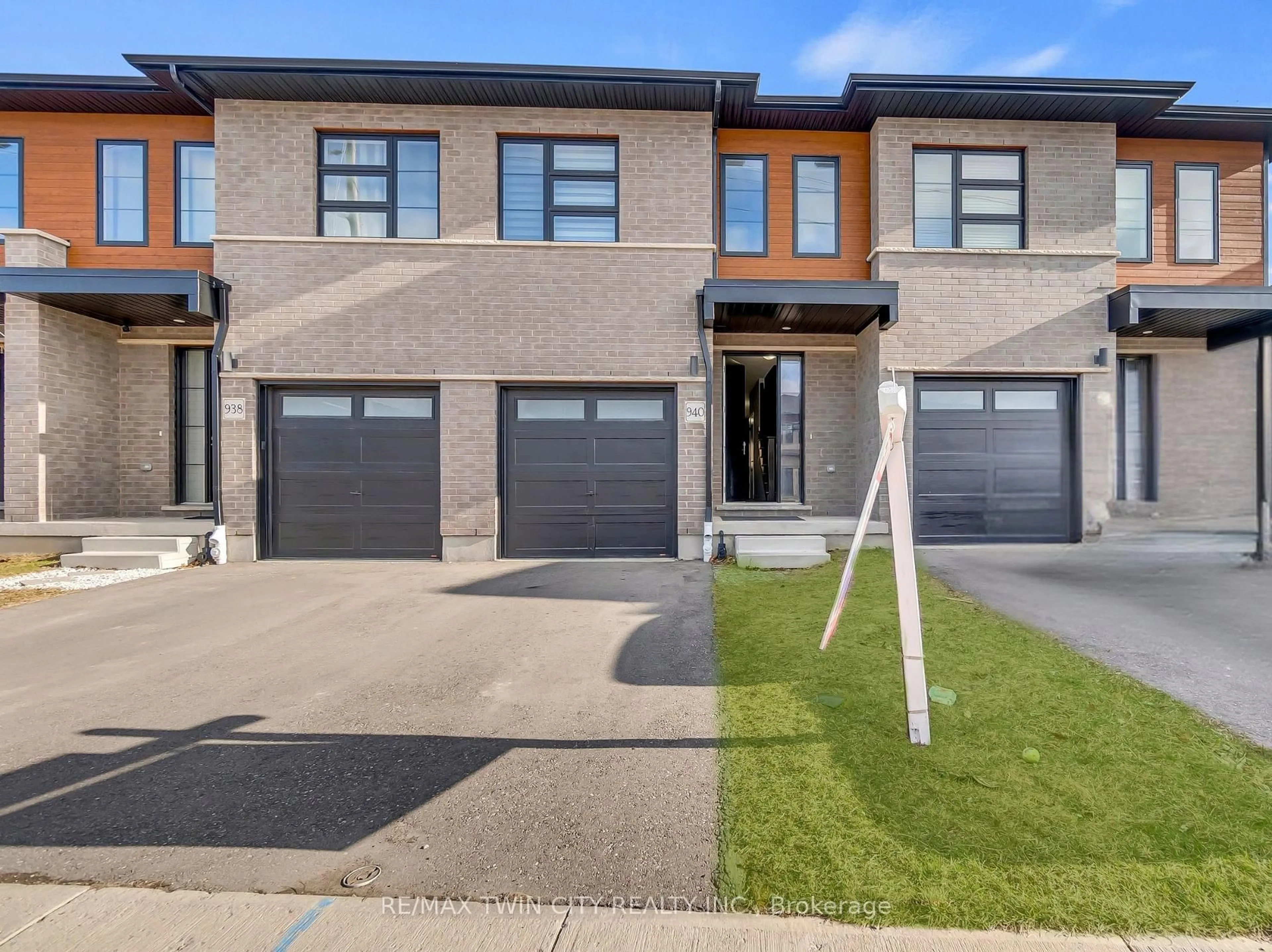 Home with brick exterior material, street for 940 Robert Ferrie Dr, Kitchener Ontario N2R 0P9