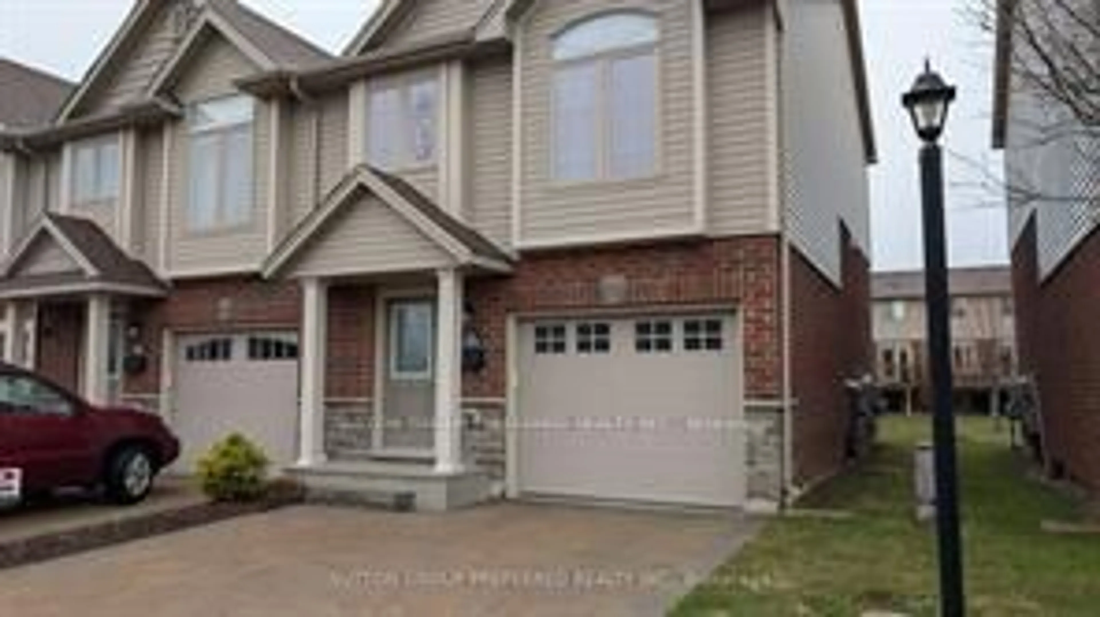 Home with brick exterior material, street for 1061 Eagletrace Dr #137, London North Ontario N6G 0T3