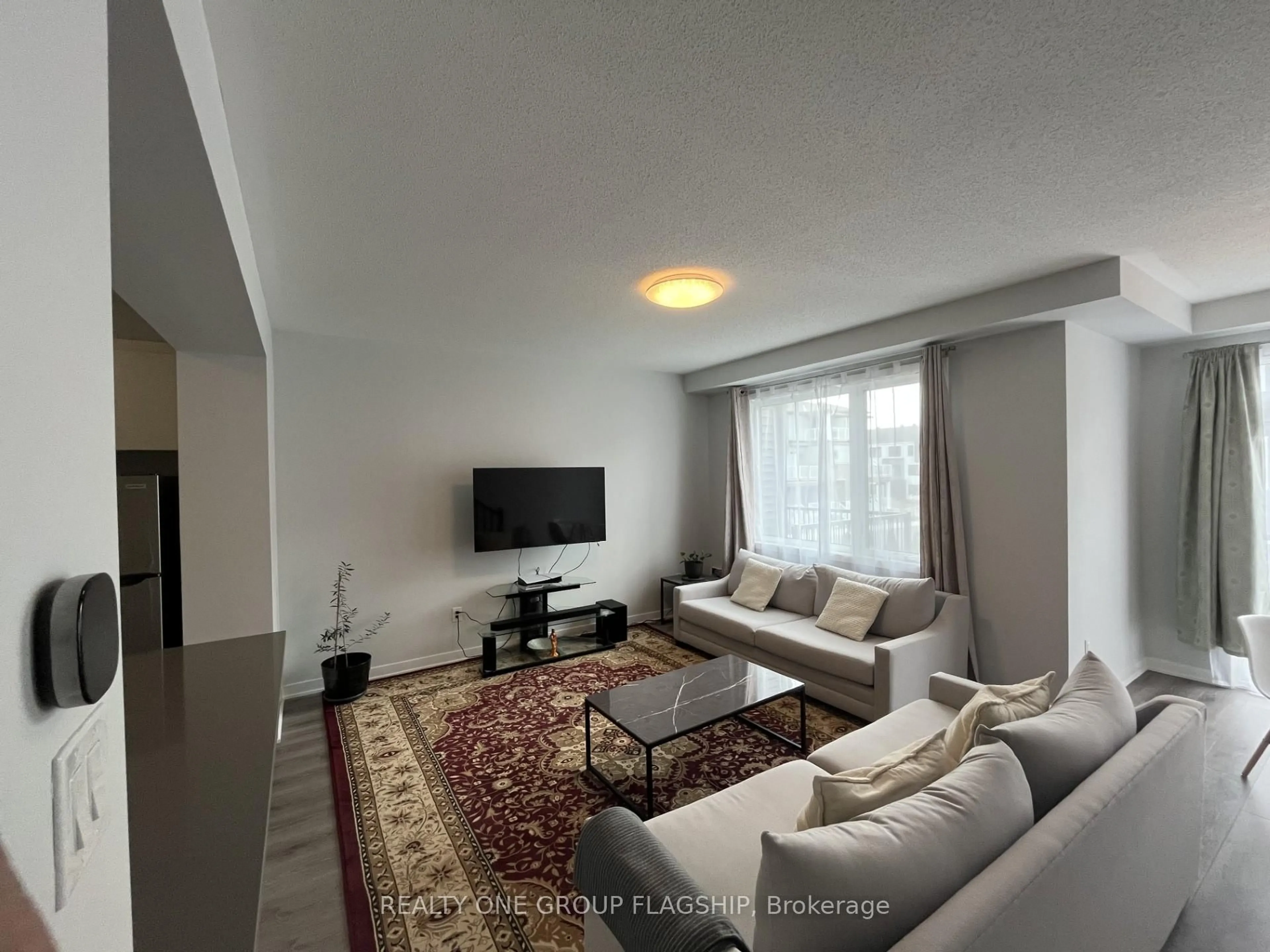 Living room with furniture, unknown for 77 Lignite Private, Ottawa Ontario K2J 7J4
