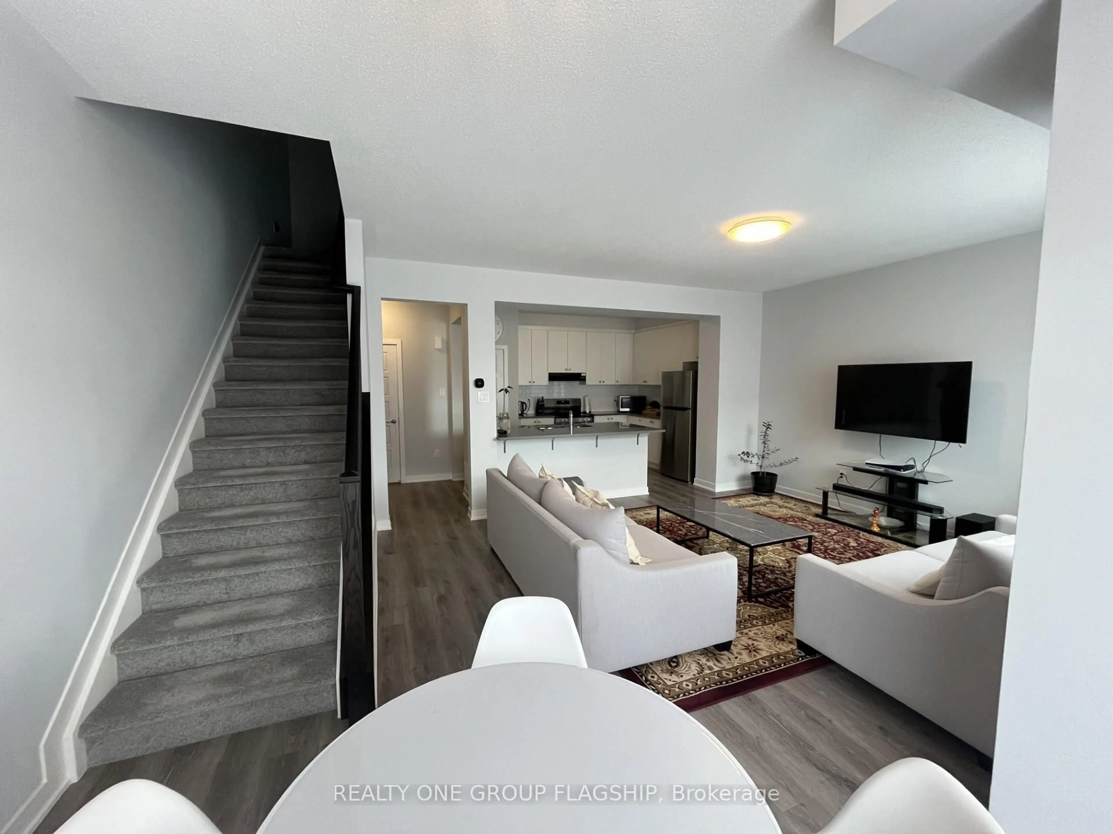 Living room with furniture, unknown for 77 Lignite Private, Ottawa Ontario K2J 7J4