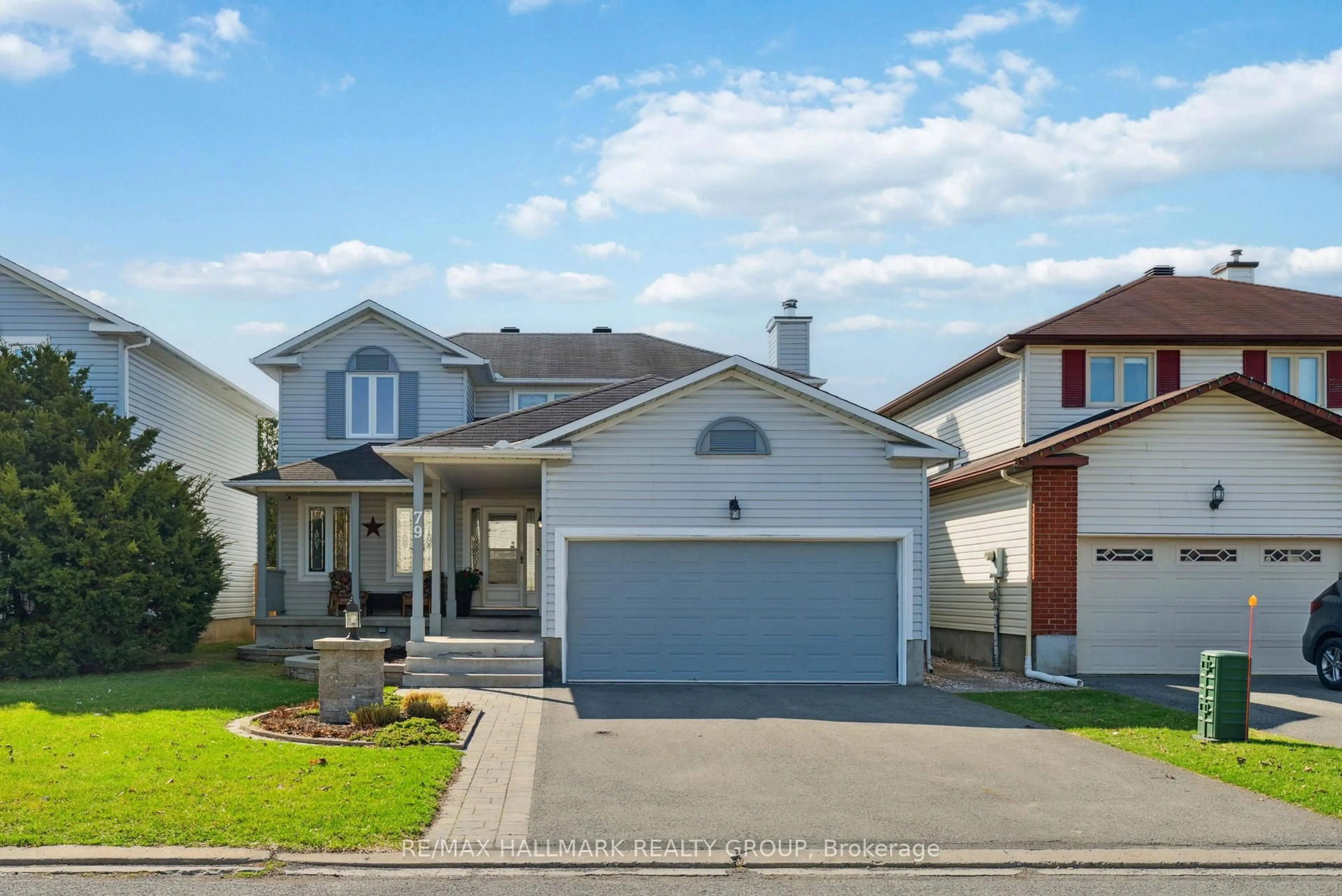 Home with vinyl exterior material, street for 79 Halley St, Ottawa Ontario K2J 3W1