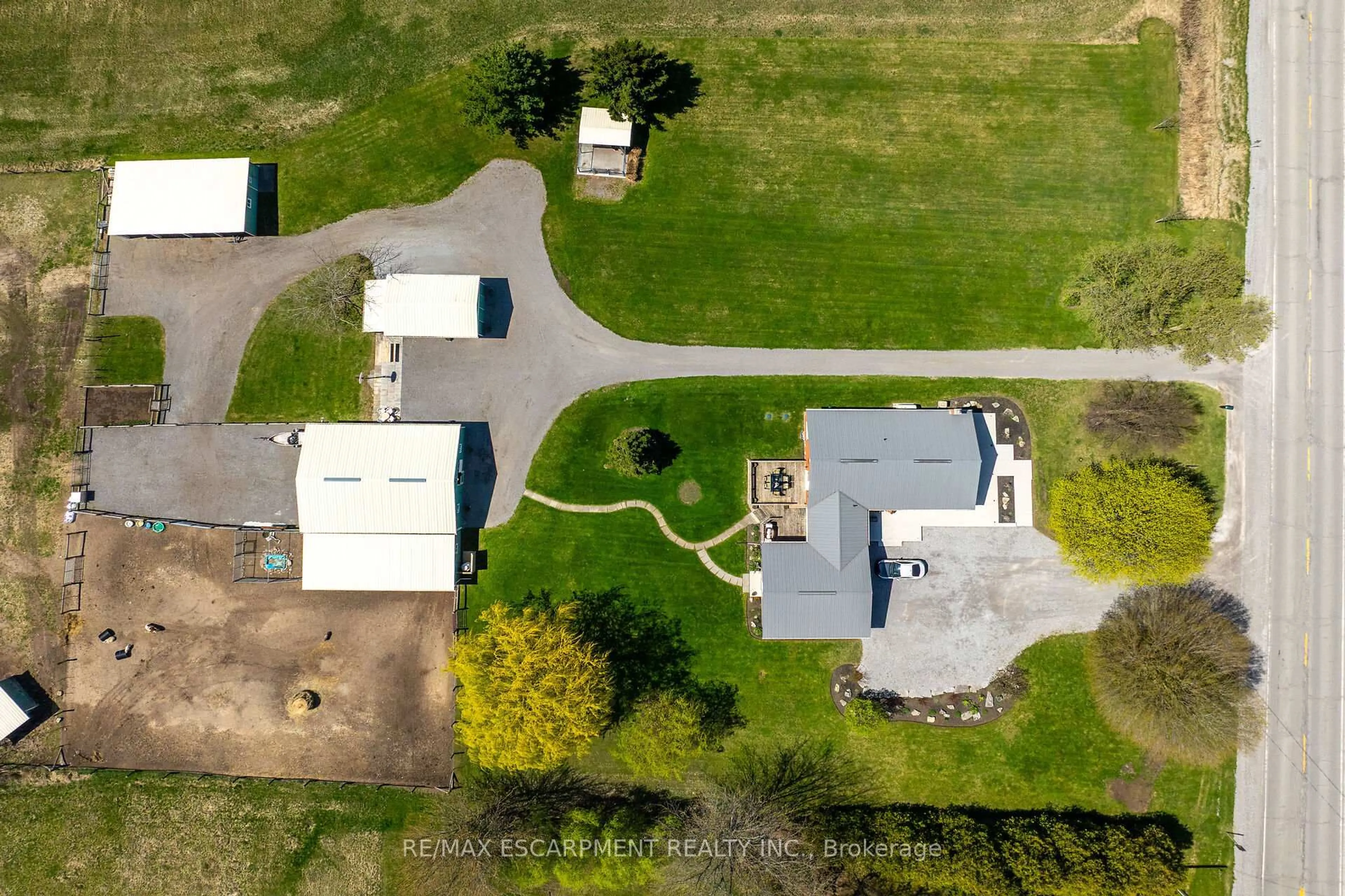 A pic from outside/outdoor area/front of a property/back of a property/a pic from drone, street for 1866 Thompson Rd, Norfolk Ontario N0A 1Y0