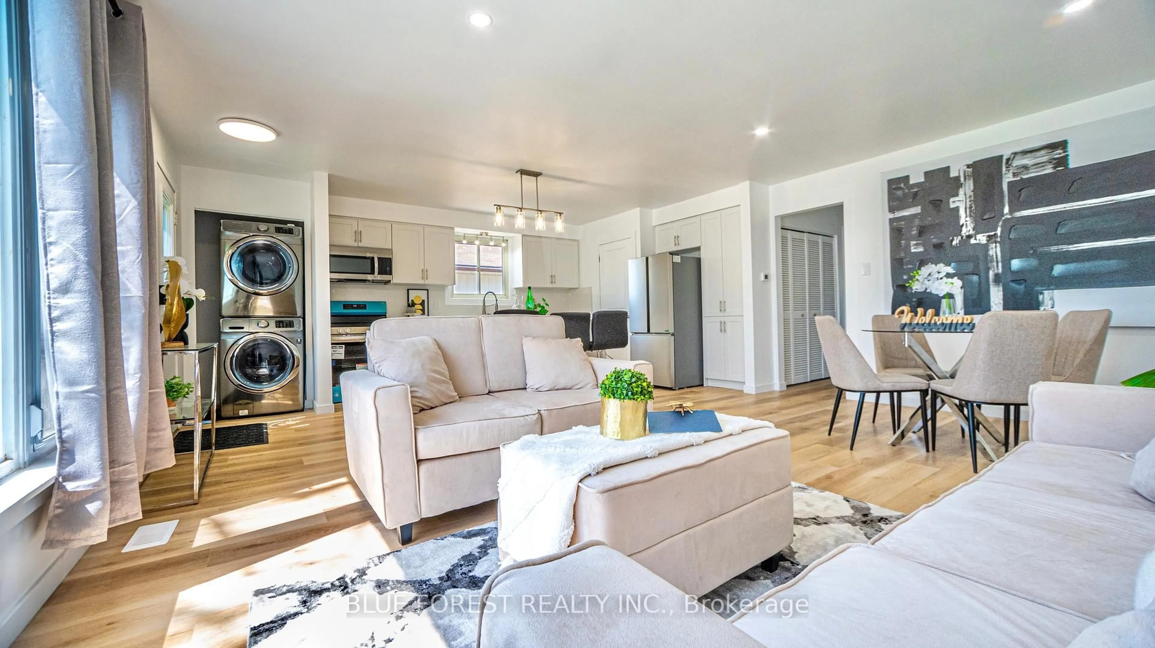 Living room with furniture, wood/laminate floor for 47 Piers Cres, London South Ontario N6E 1Z1