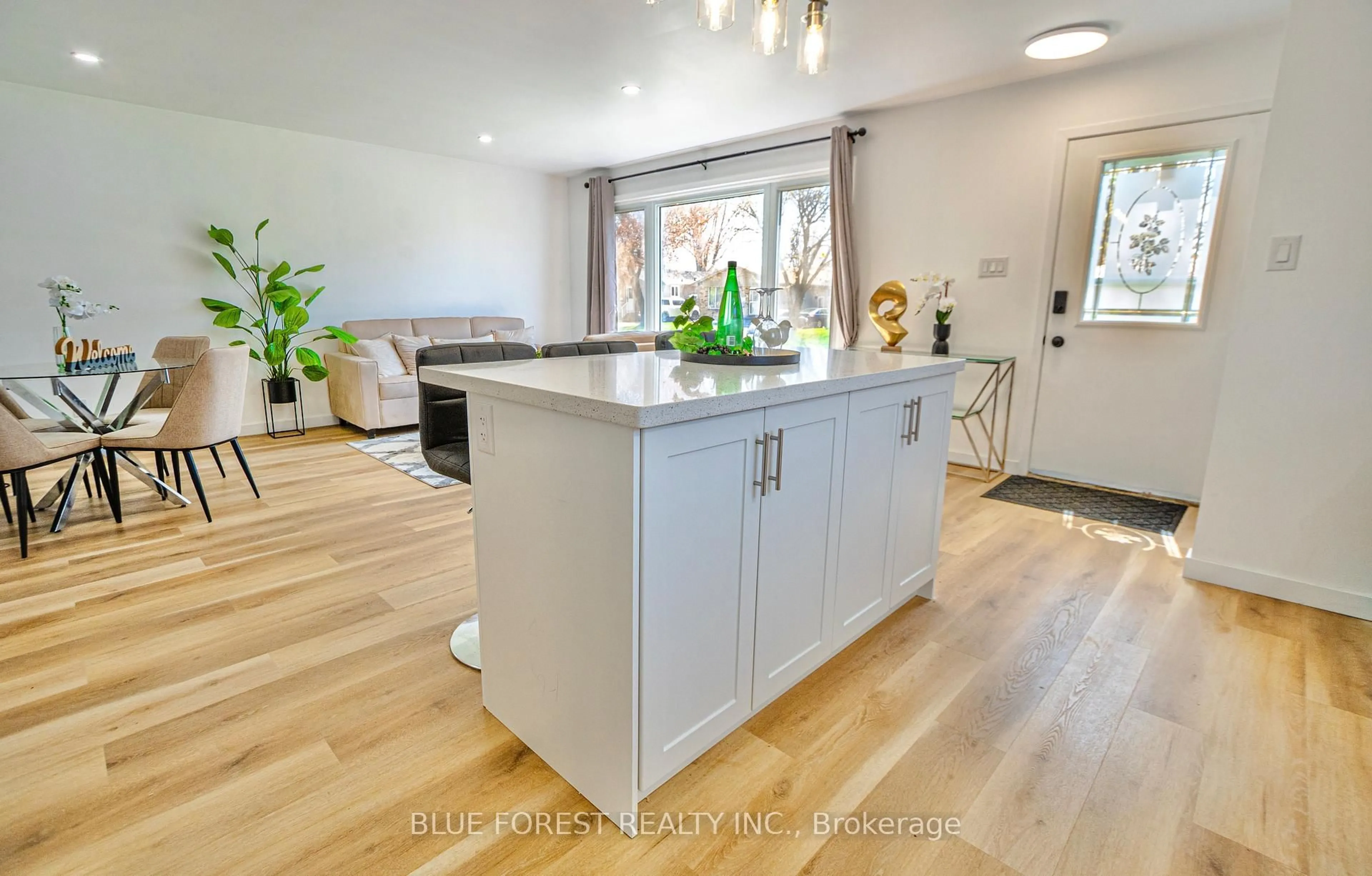 Open concept kitchen, wood/laminate floor for 47 Piers Cres, London South Ontario N6E 1Z1