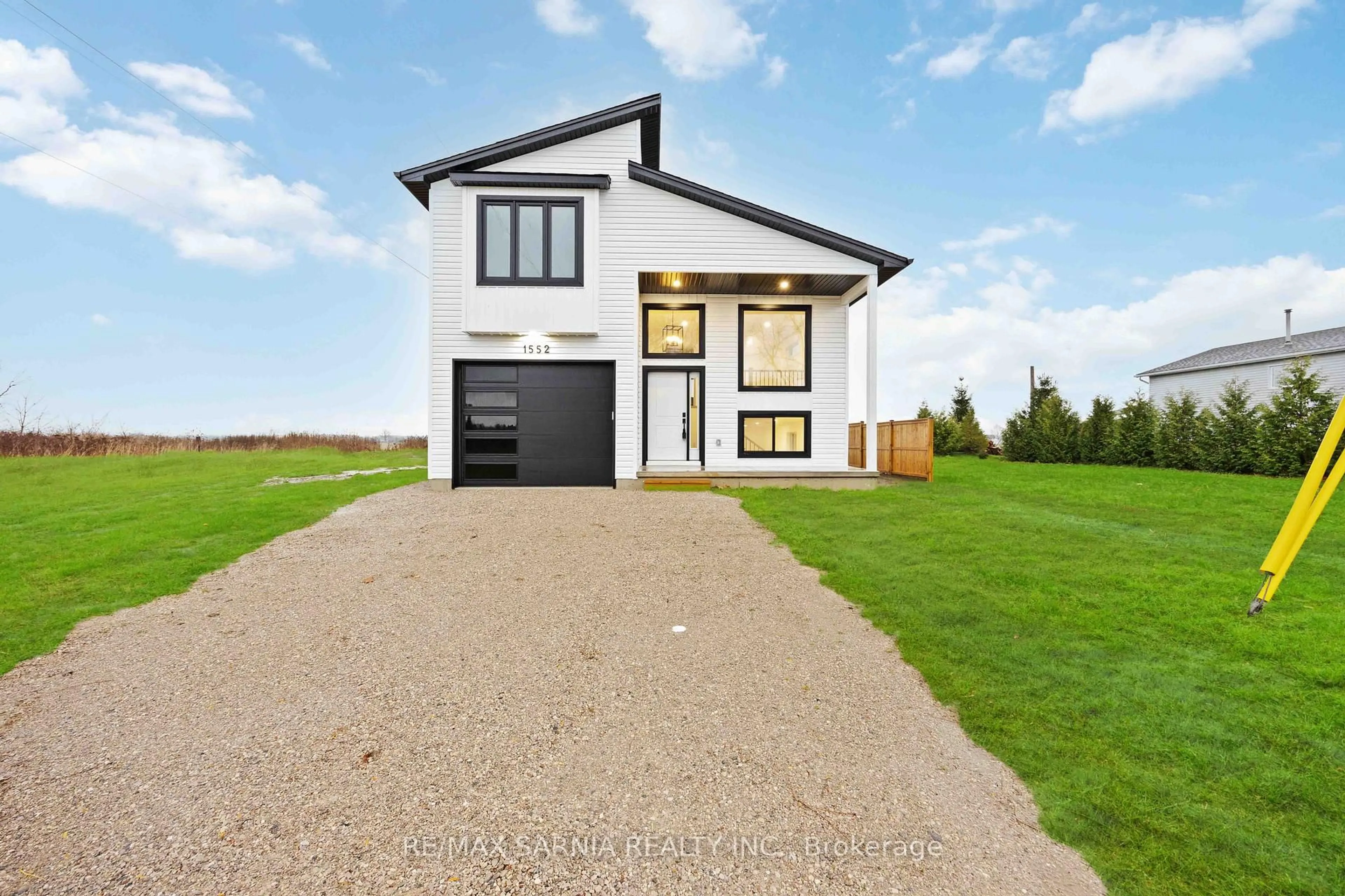 Home with brick exterior material, street for 1552 MELWOOD Dr, St. Clair Ontario N0N 1B0