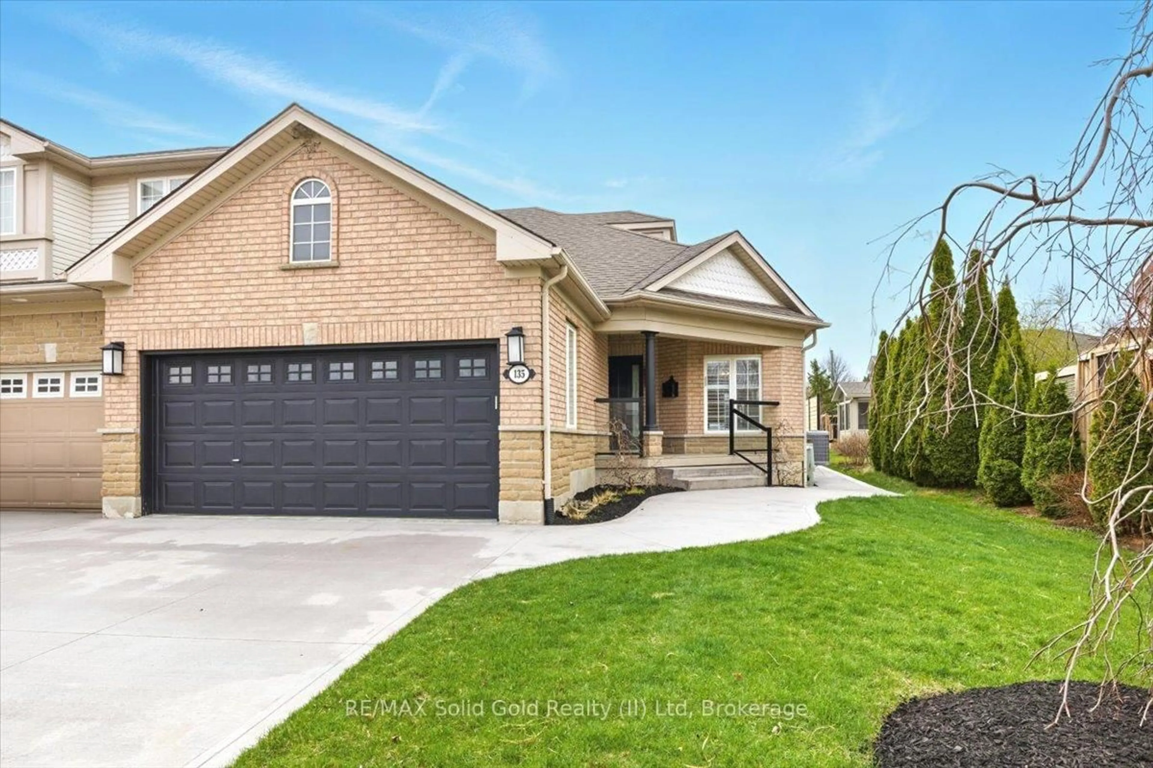 Home with brick exterior material, street for 135 Reiber Crt, Waterloo Ontario N2L 6M9
