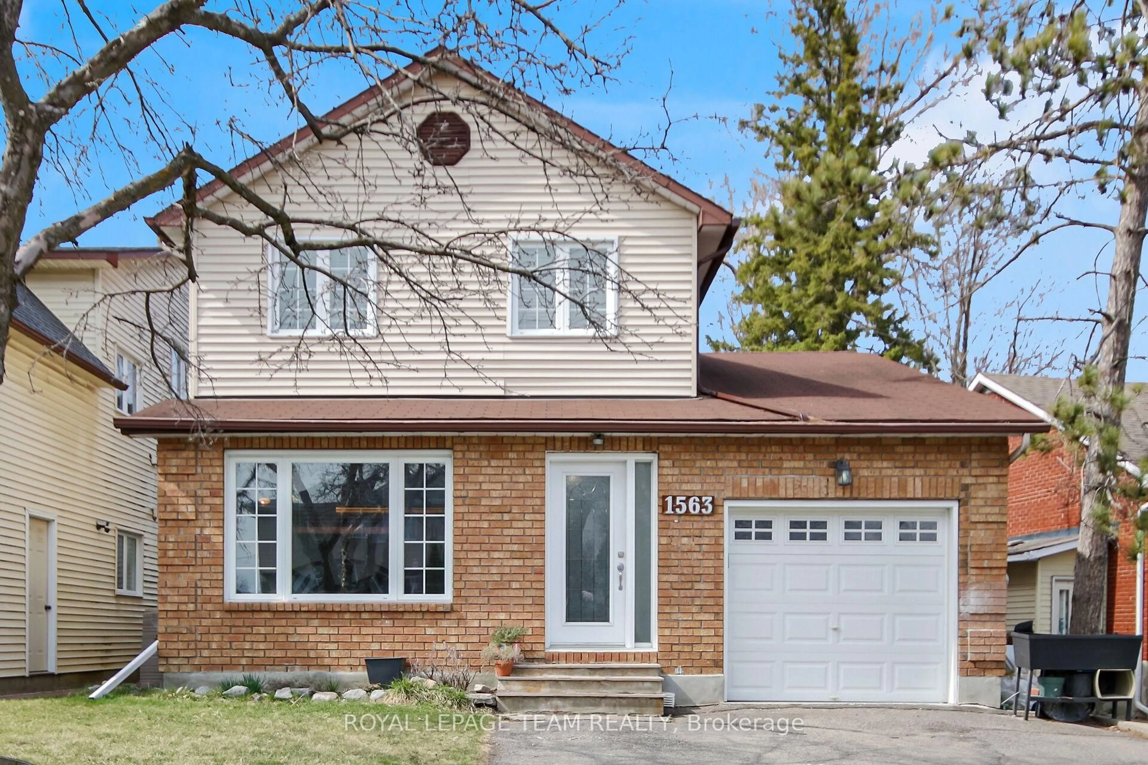 Home with brick exterior material, street for 1563 Goth Ave, Ottawa Ontario K1T 1E3