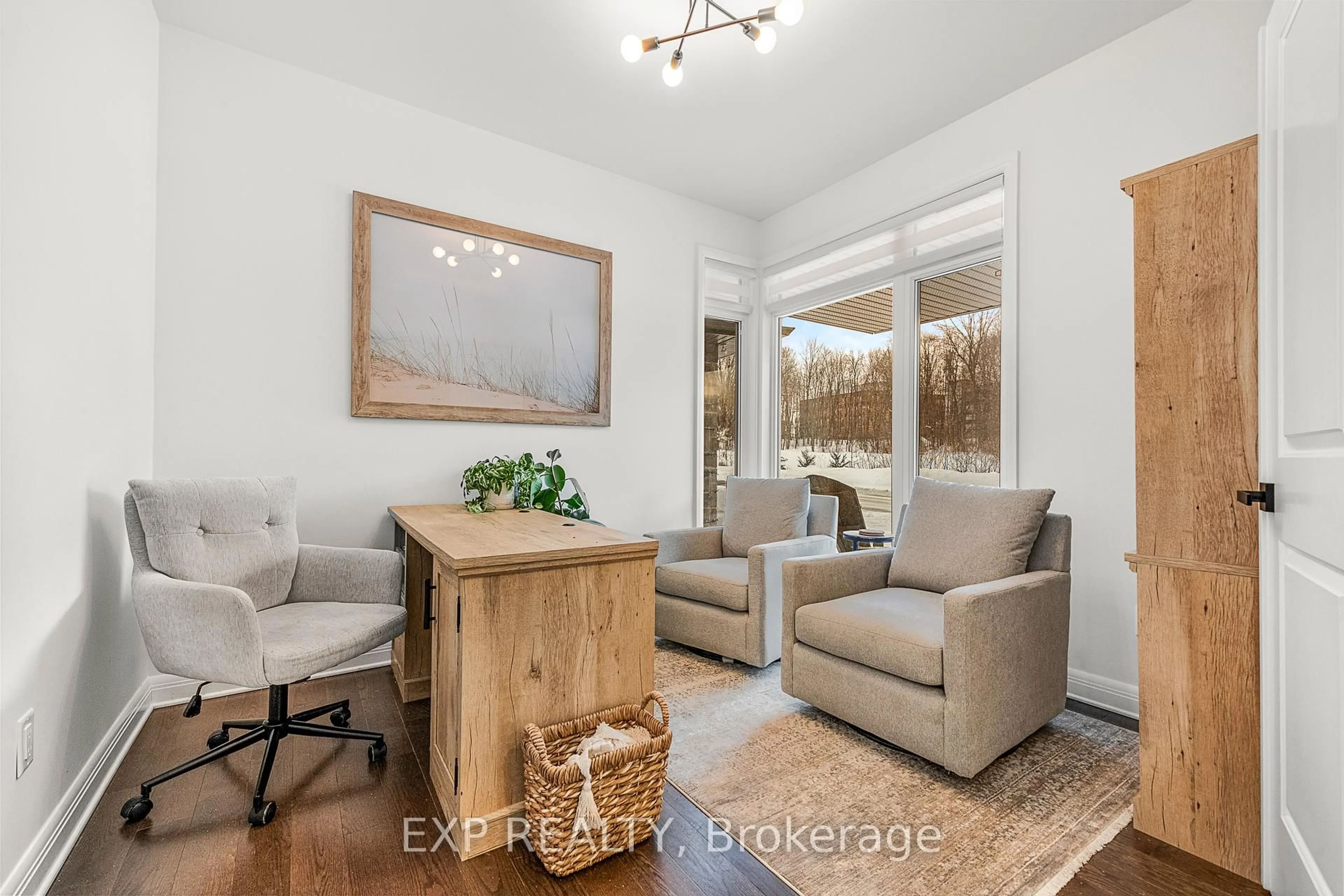 Living room with furniture, wood/laminate floor for 204 Avro Circ, Ottawa Ontario K1K 4Y9