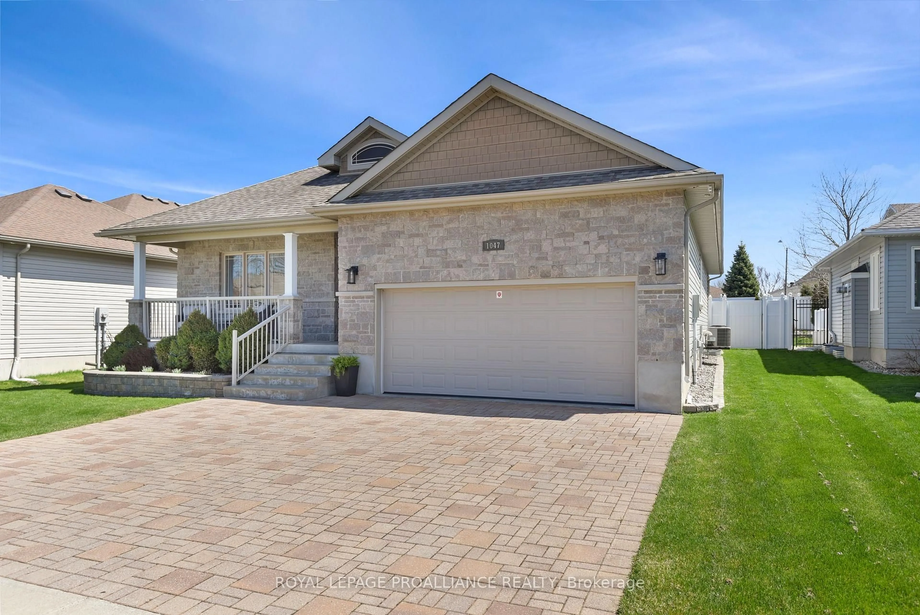 Home with brick exterior material, street for 1047 Fitzsimmons Dr, Brockville Ontario K6V 0A1