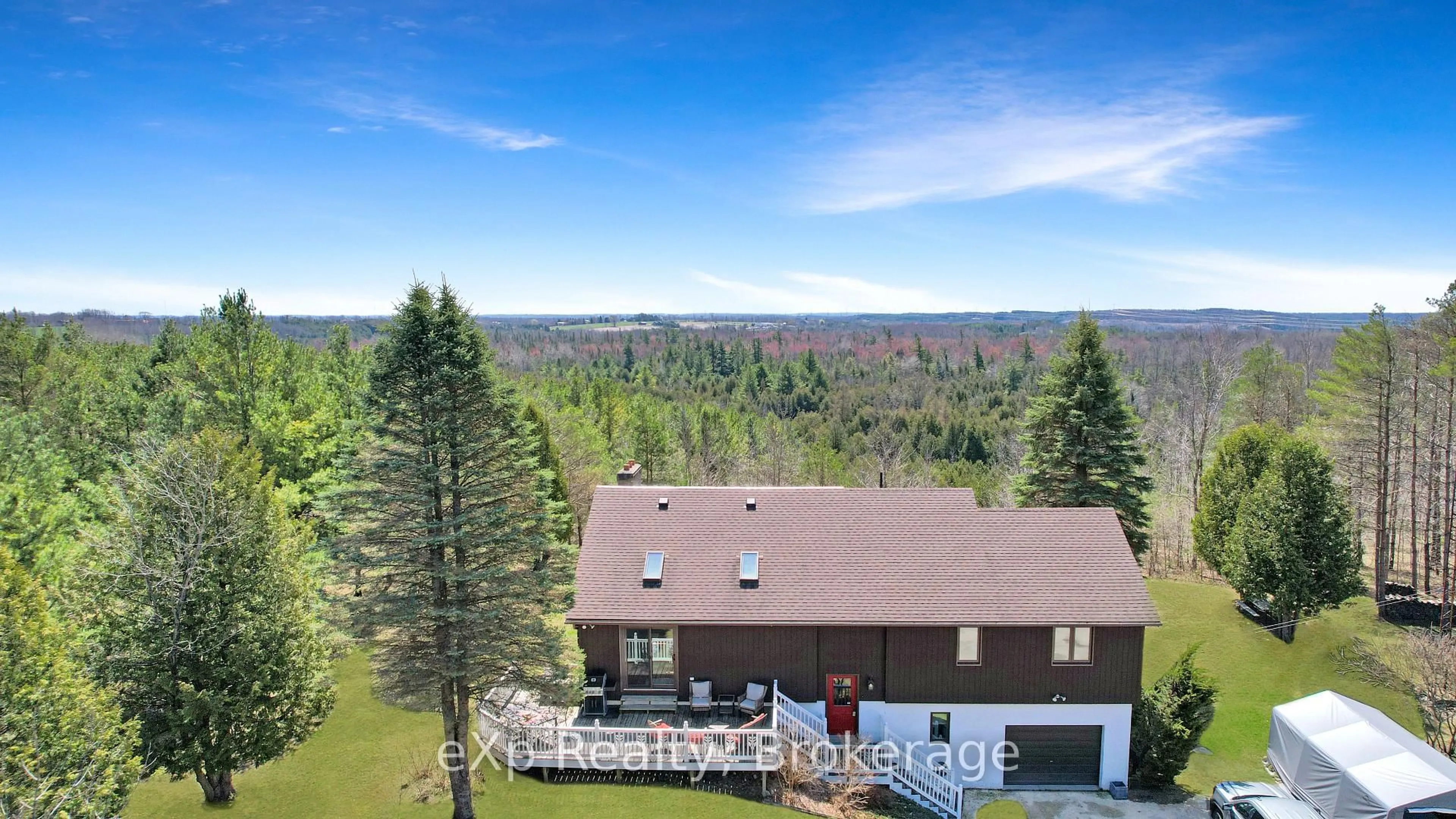 A pic from outside/outdoor area/front of a property/back of a property/a pic from drone, forest/trees view for 154 Gravel Rd, West Grey Ontario N4N 3B9