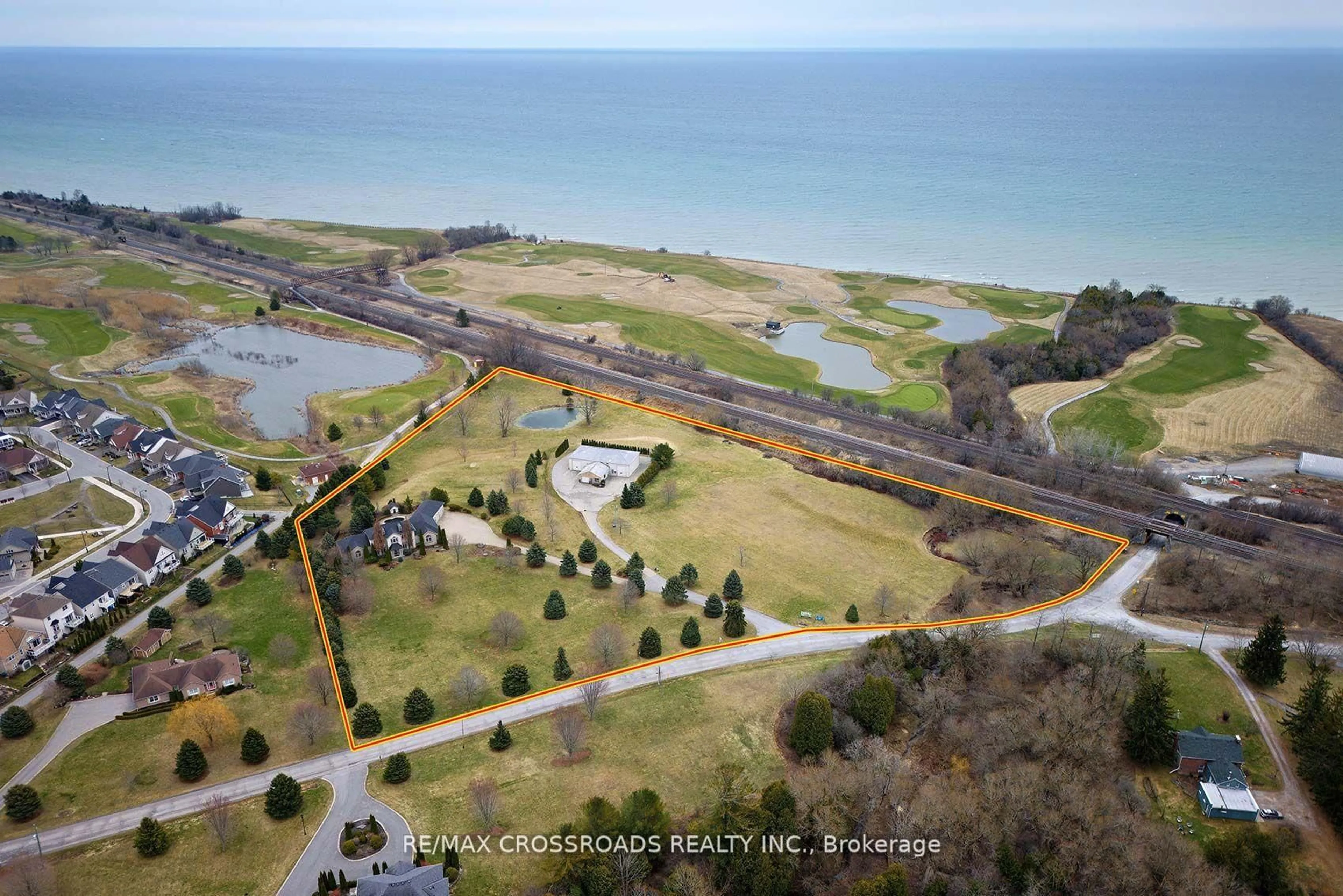 A pic from outside/outdoor area/front of a property/back of a property/a pic from drone, water/lake/river/ocean view for 5717 Lakeshore Rd, Port Hope Ontario L1A 3V7