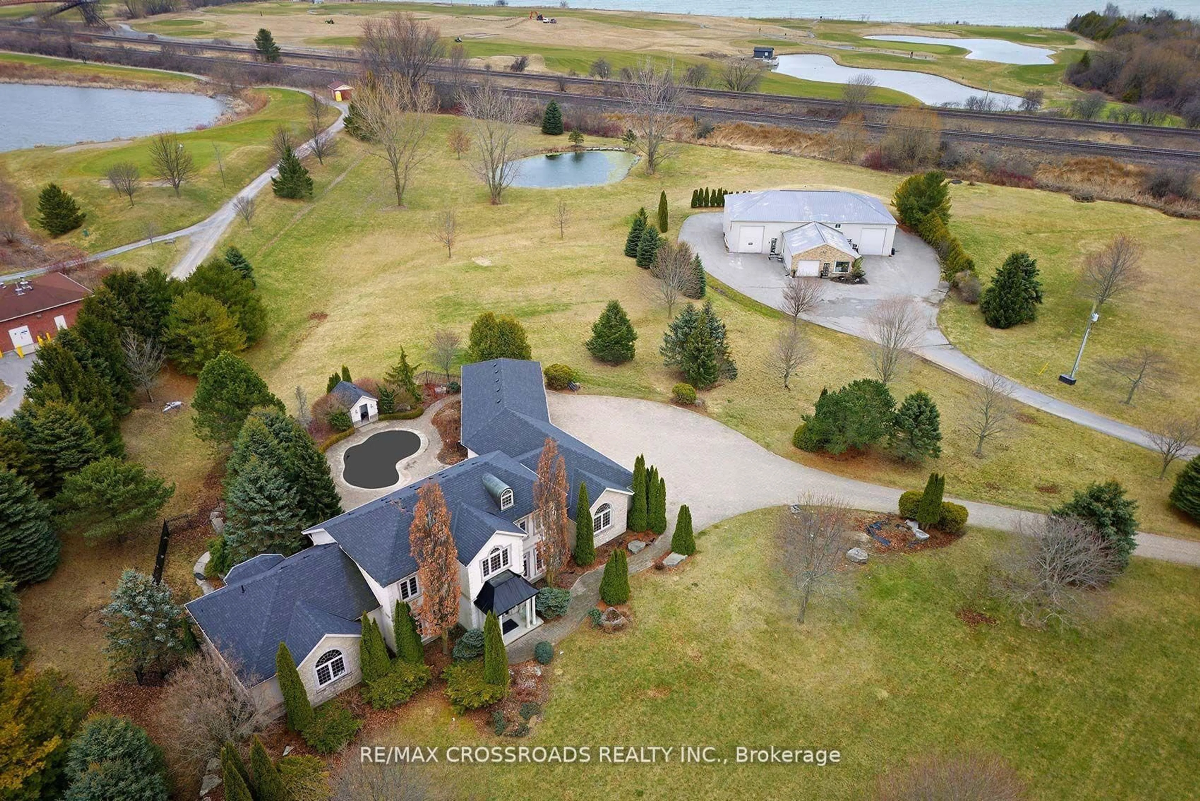A pic from outside/outdoor area/front of a property/back of a property/a pic from drone, water/lake/river/ocean view for 5717 Lakeshore Rd, Port Hope Ontario L1A 3V7