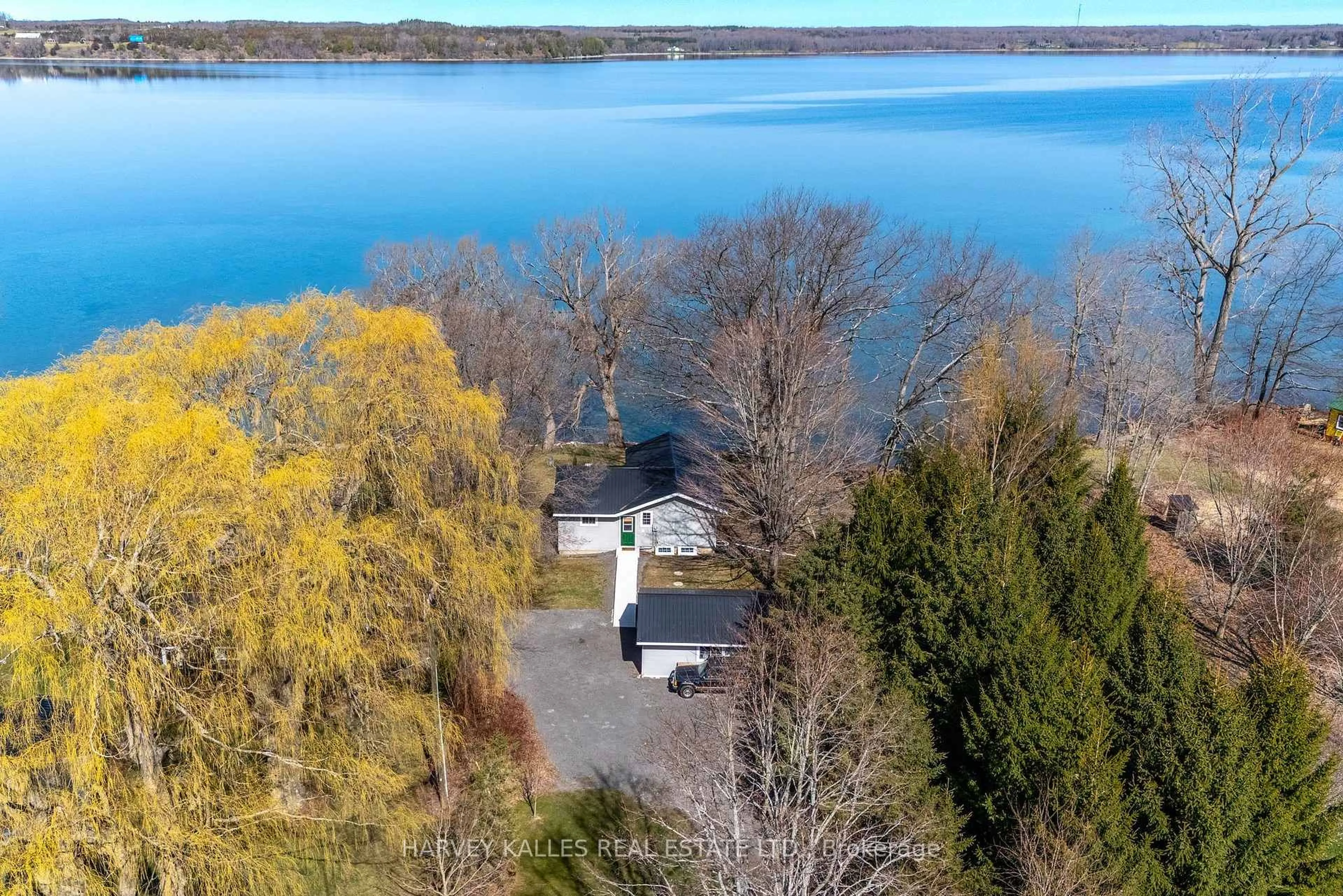 A pic from outside/outdoor area/front of a property/back of a property/a pic from drone, water/lake/river/ocean view for 2971 County Rd 13 N/A, Prince Edward County Ontario K0K 2T0