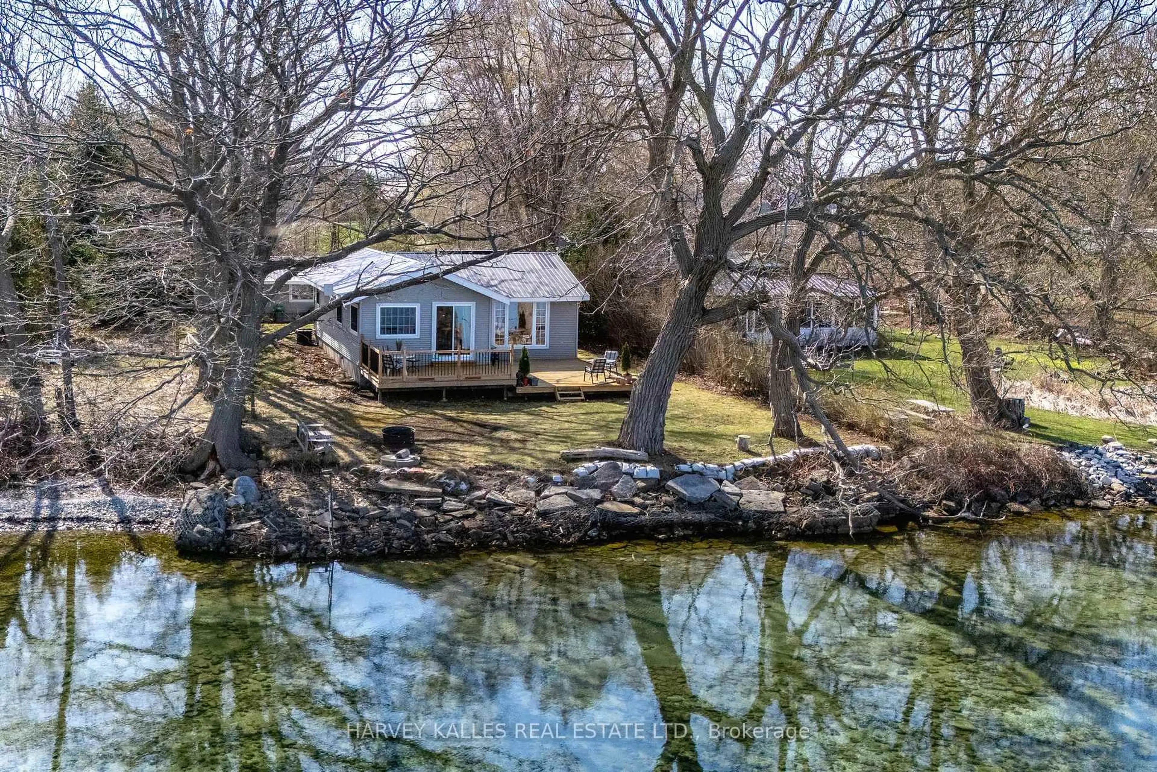 A pic from outside/outdoor area/front of a property/back of a property/a pic from drone, water/lake/river/ocean view for 2971 County Rd 13 N/A, Prince Edward County Ontario K0K 2T0