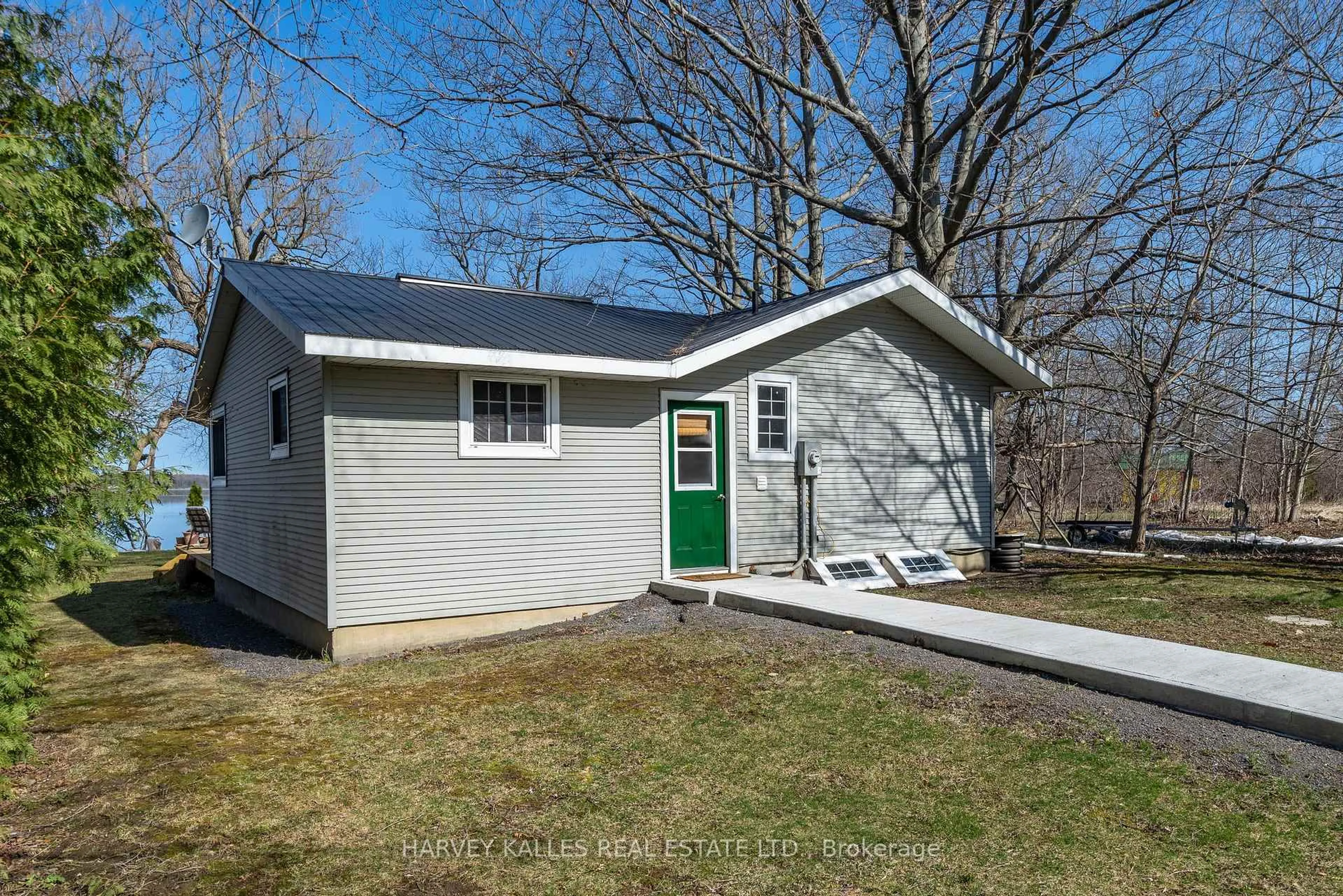 Home with vinyl exterior material, street for 2971 County Rd 13 N/A, Prince Edward County Ontario K0K 2T0