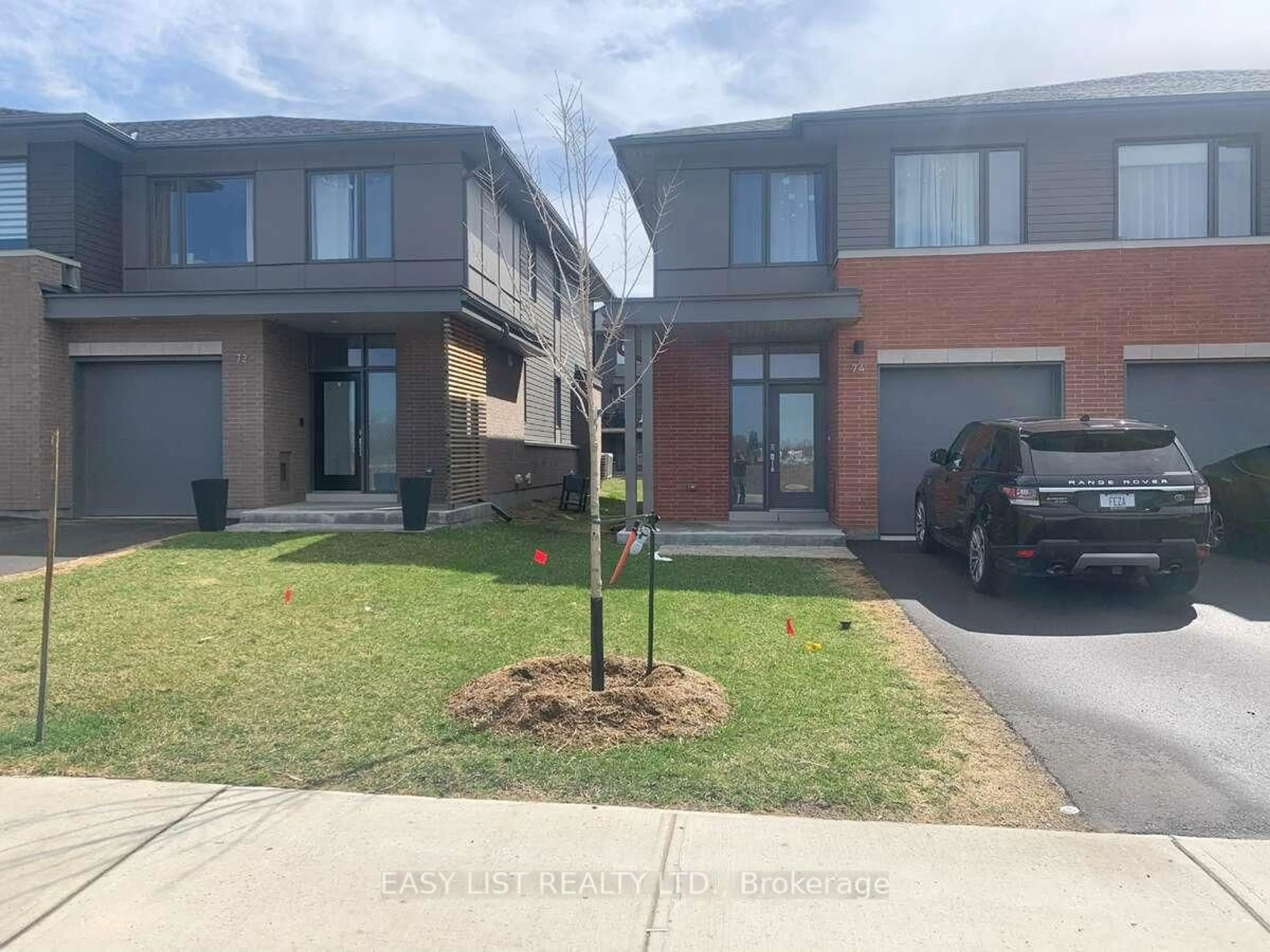 A pic from outside/outdoor area/front of a property/back of a property/a pic from drone, street for 74 Michael Stoqua St, Ottawa Ontario K1K 5A2