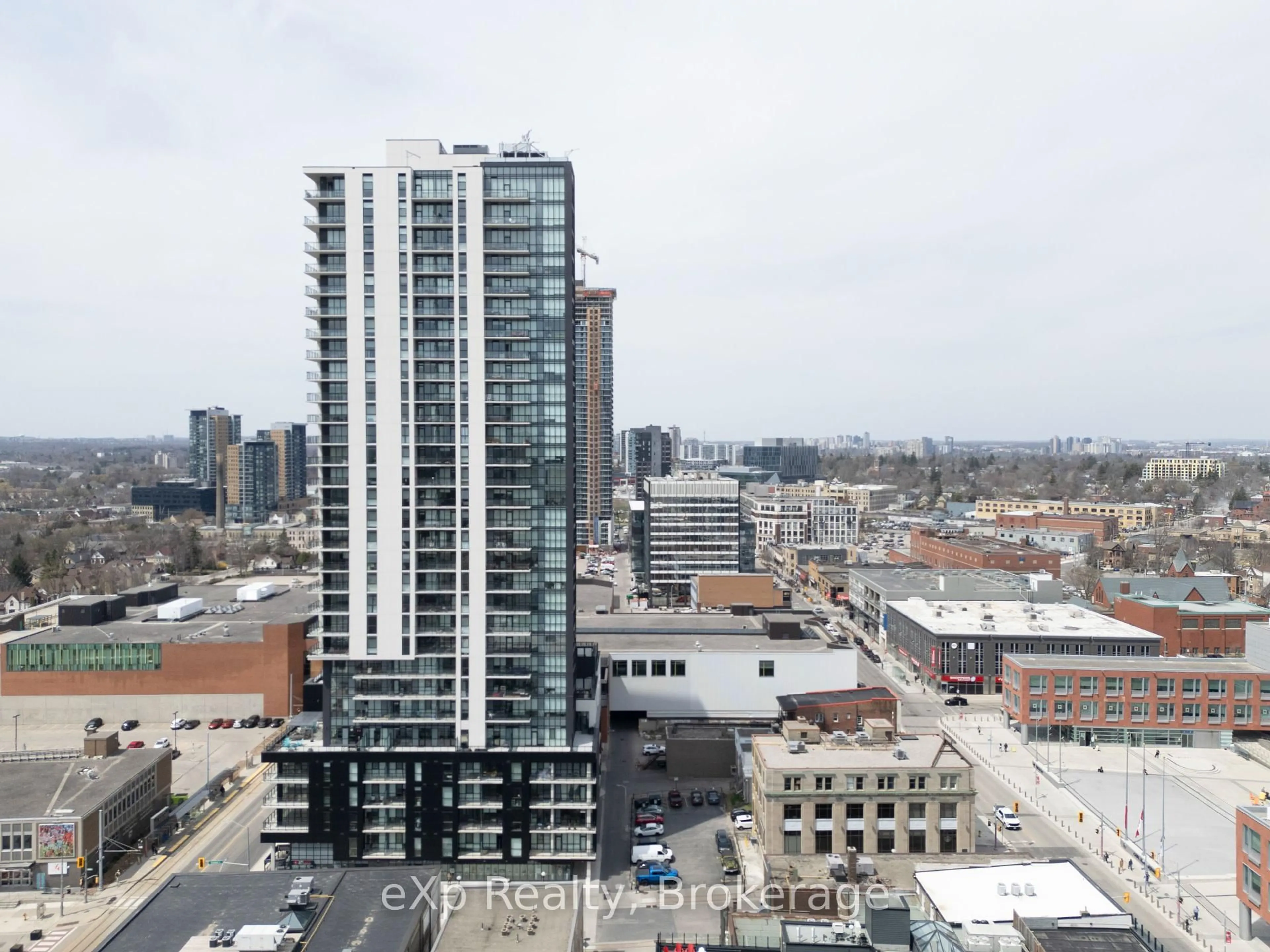 A pic from outside/outdoor area/front of a property/back of a property/a pic from drone, city buildings view from balcony for 60 Charles St #1703, Kitchener Ontario N2G 0C9