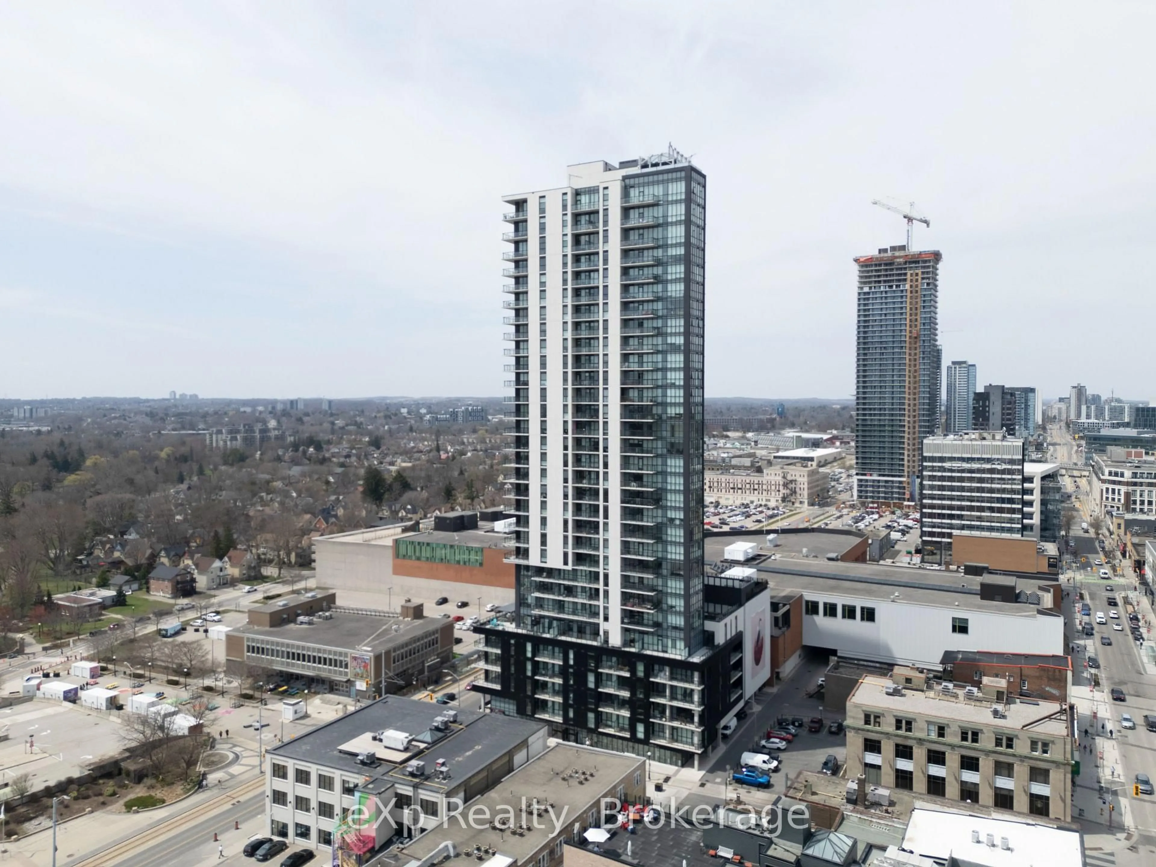 A pic from outside/outdoor area/front of a property/back of a property/a pic from drone, city buildings view from balcony for 60 Charles St #1703, Kitchener Ontario N2G 0C9