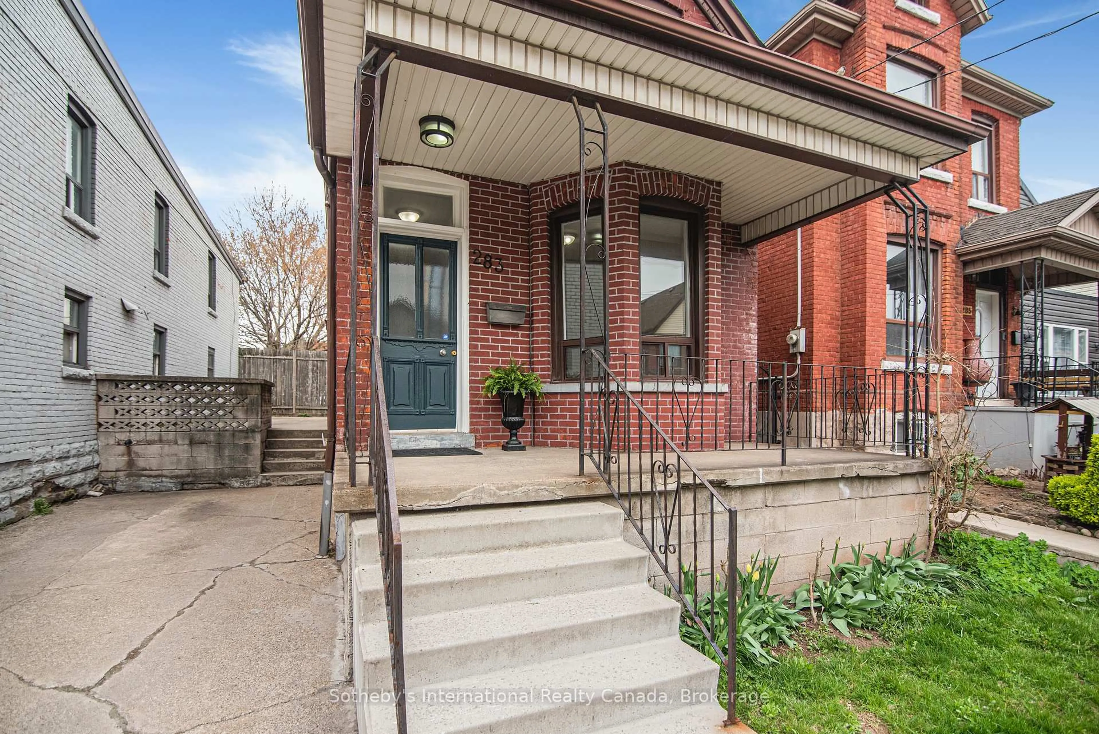 Home with brick exterior material, street for 283 Emerald St, Hamilton Ontario L8L 5L2