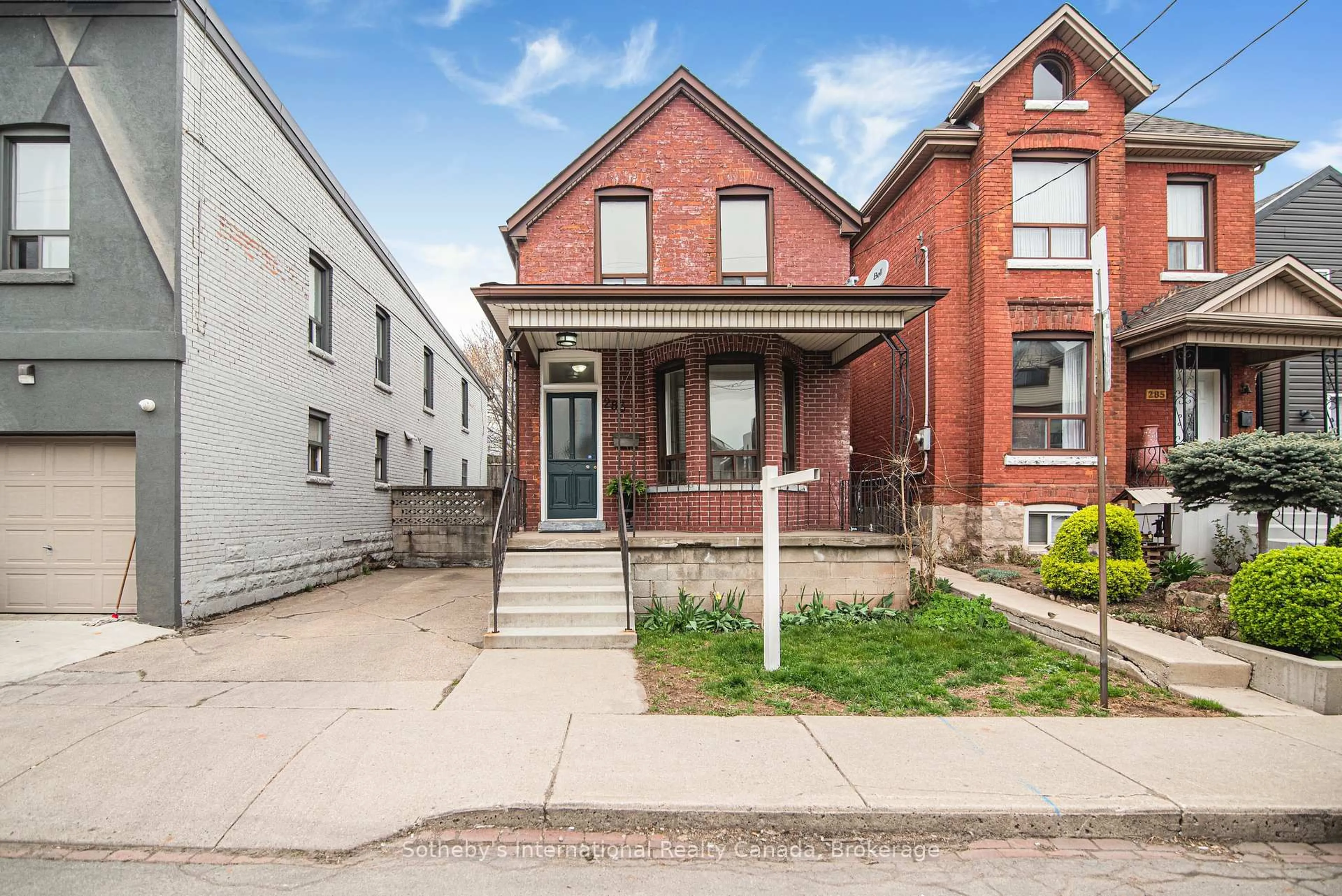 Home with brick exterior material, street for 283 Emerald St, Hamilton Ontario L8L 5L2