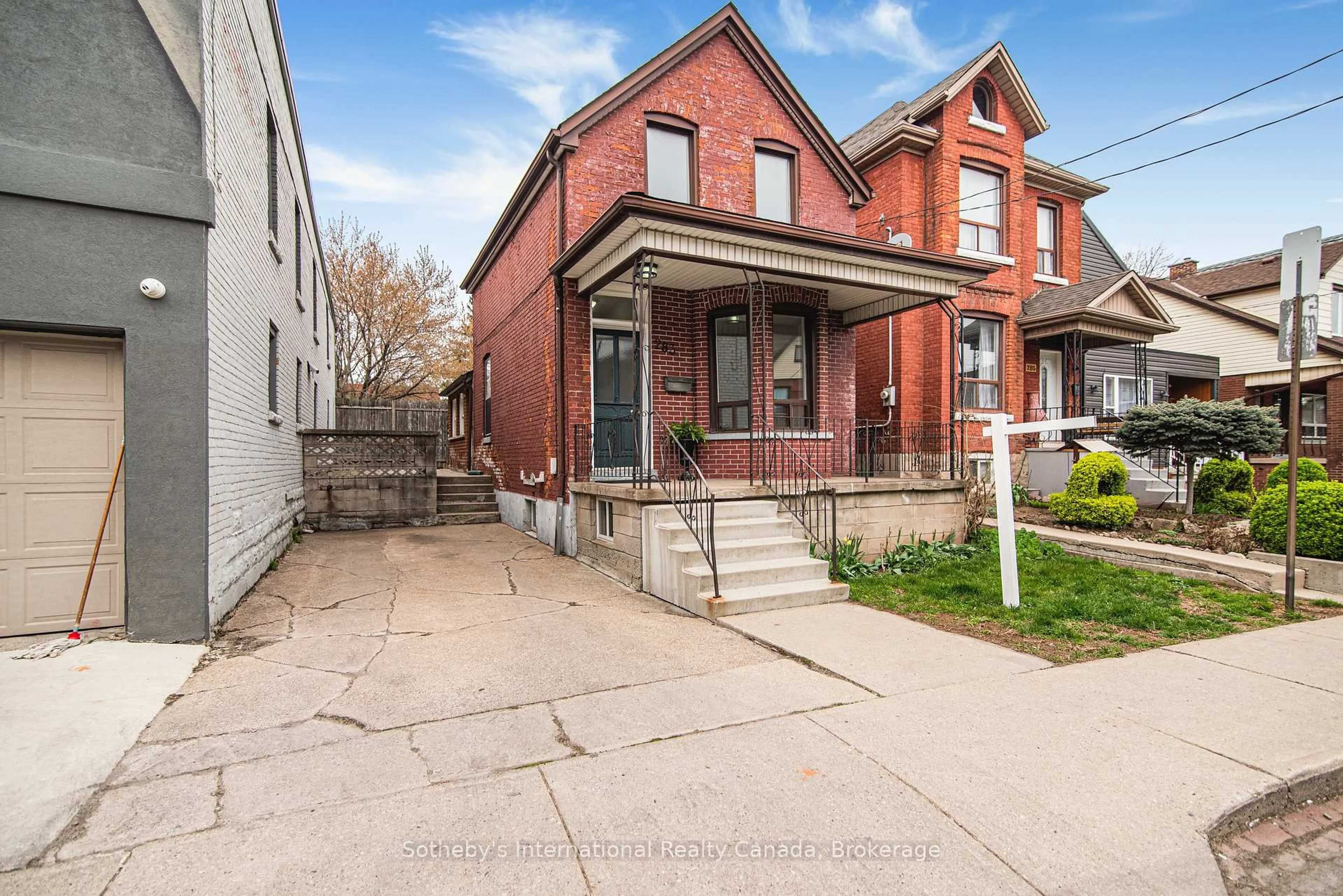 Home with brick exterior material, street for 283 Emerald St, Hamilton Ontario L8L 5L2