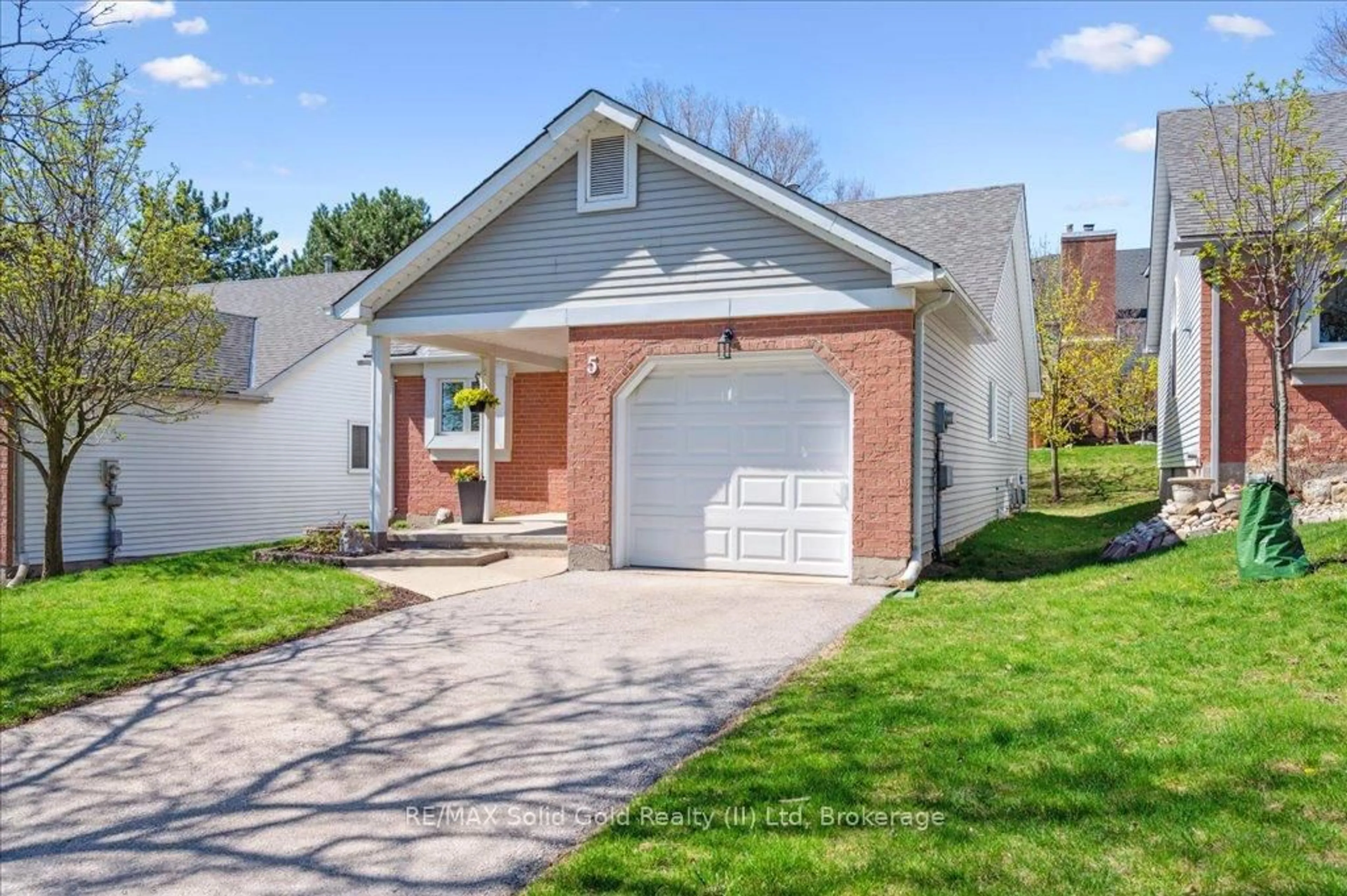 Home with brick exterior material, street for 5 Quinte Cres, Kitchener Ontario N2A 3K2