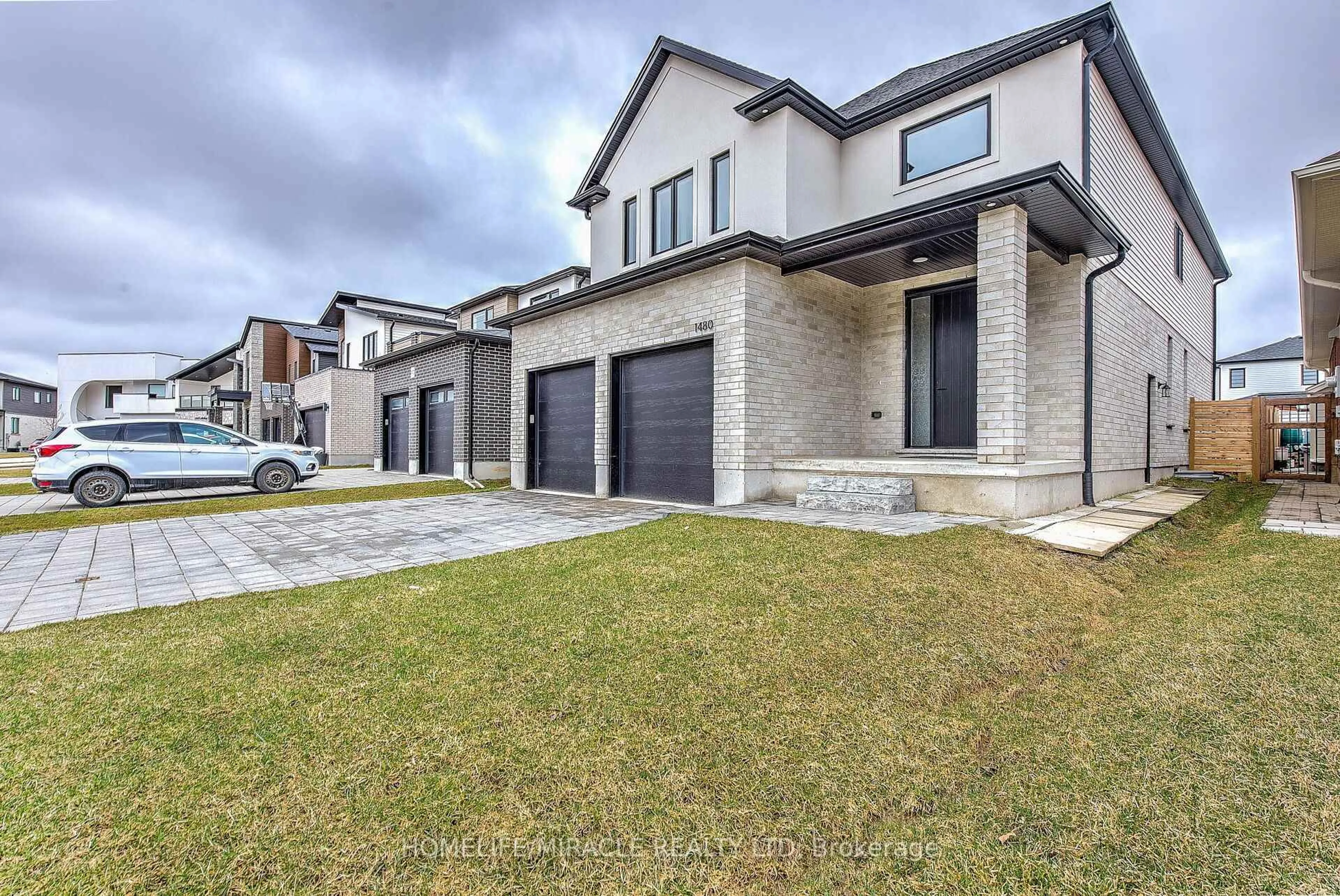 Home with brick exterior material, street for 1480 Medway Park Dr, London Ontario N6G 0Z6