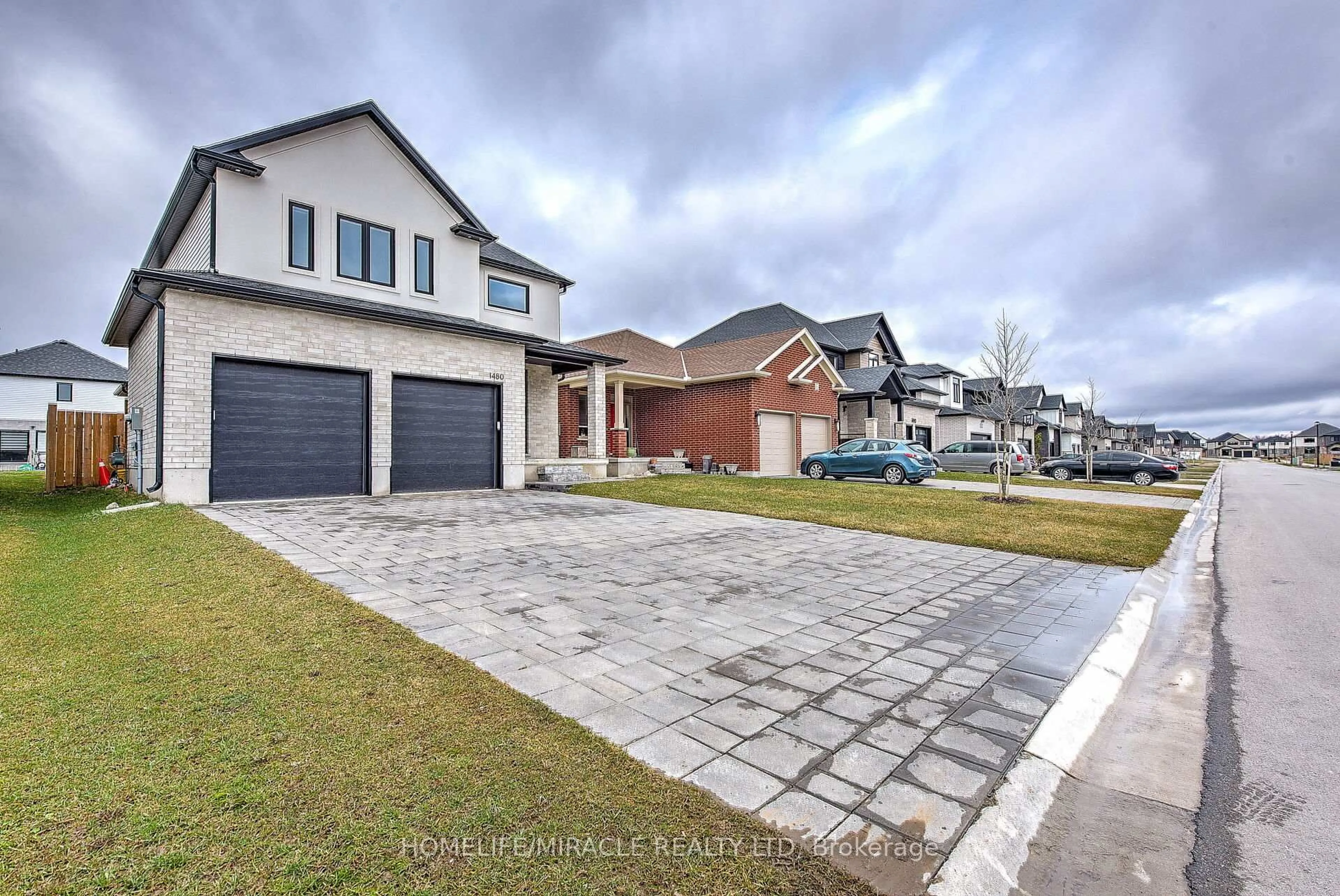 Home with brick exterior material, street for 1480 Medway Park Dr, London Ontario N6G 0Z6