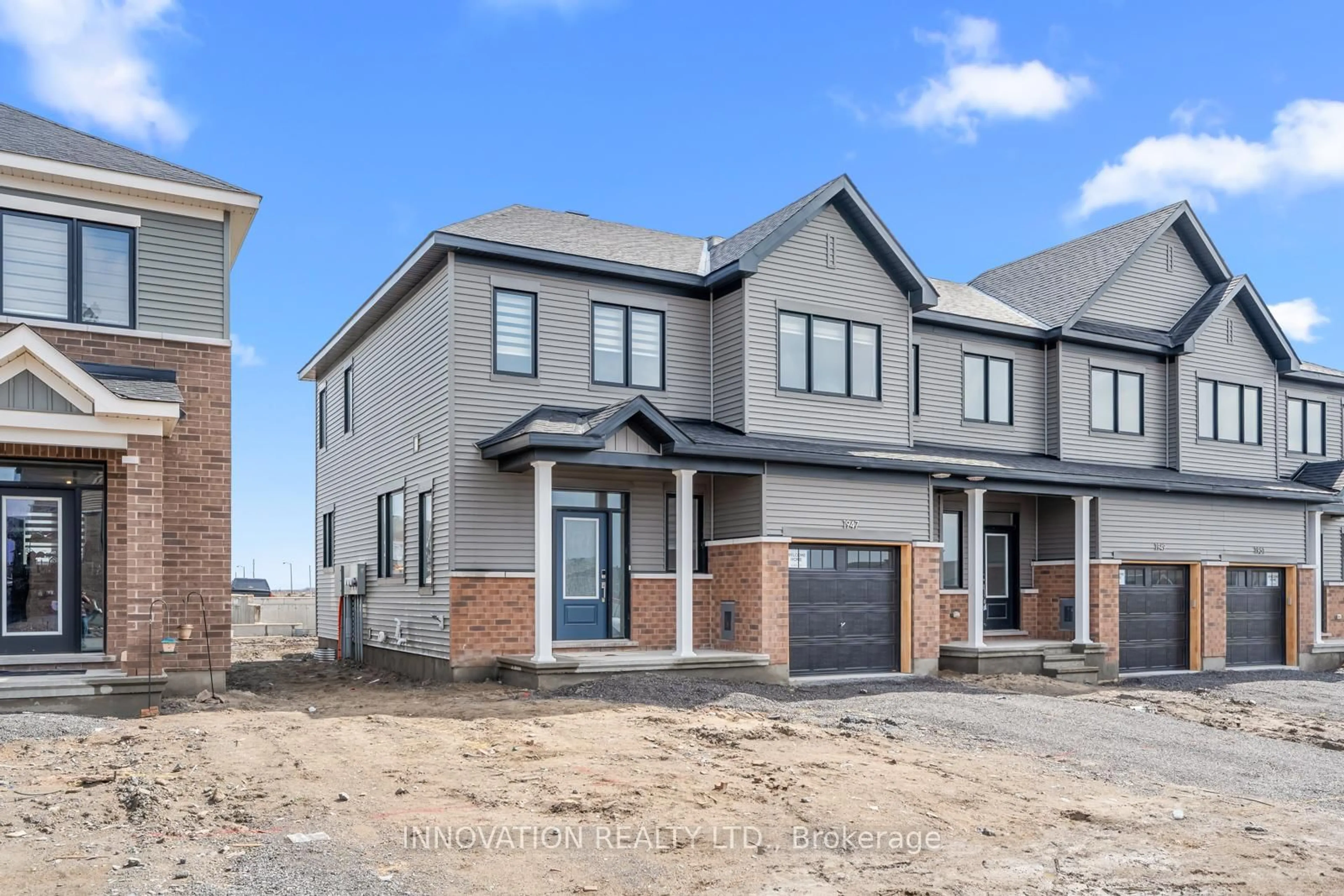 Home with brick exterior material, street for 1947 Elevation Rd, Barrhaven Ontario K2J 7H1