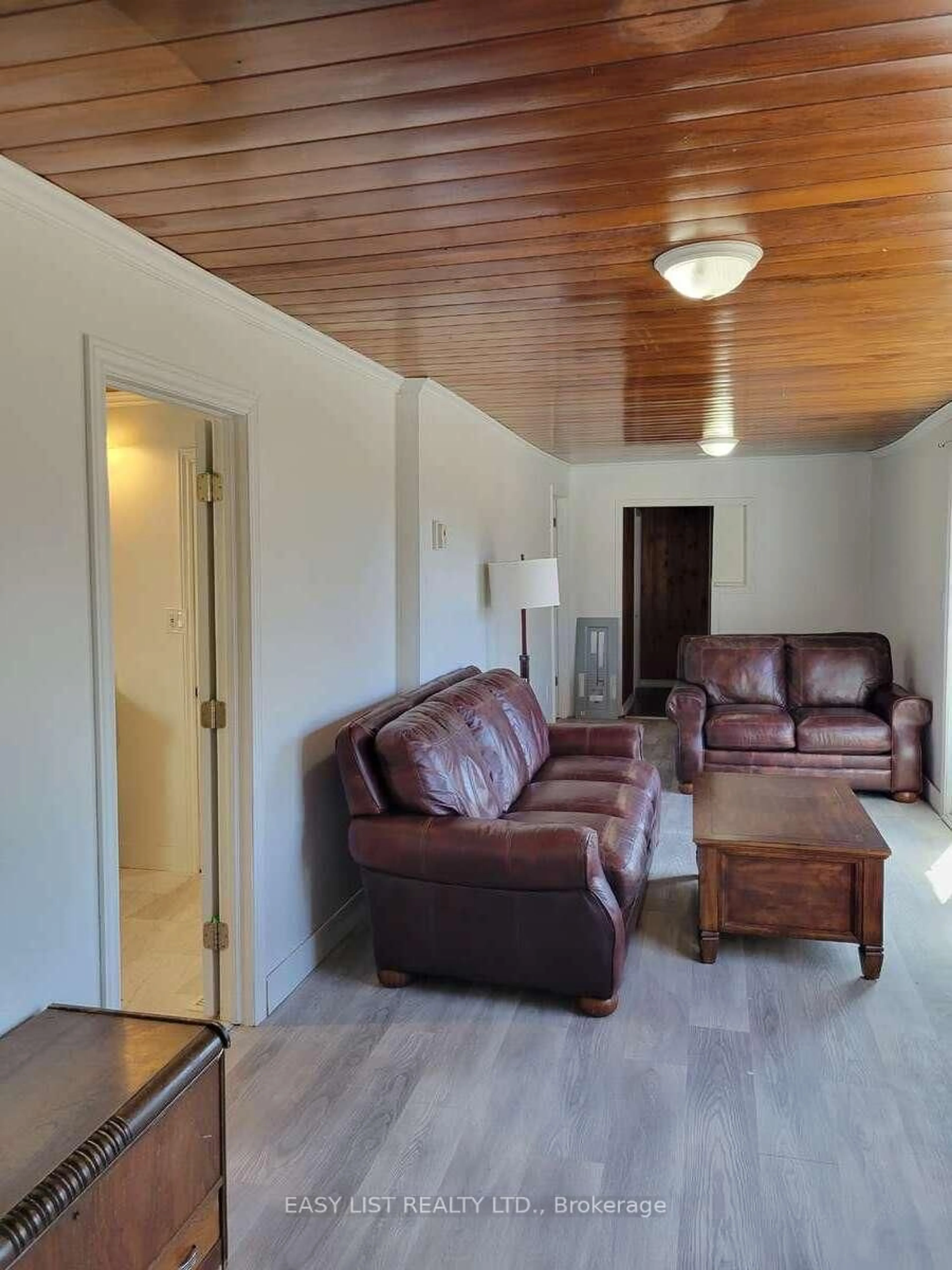 Living room with furniture, wood/laminate floor for 10419 28 N/A, North Kawartha Ontario K0L 1A0