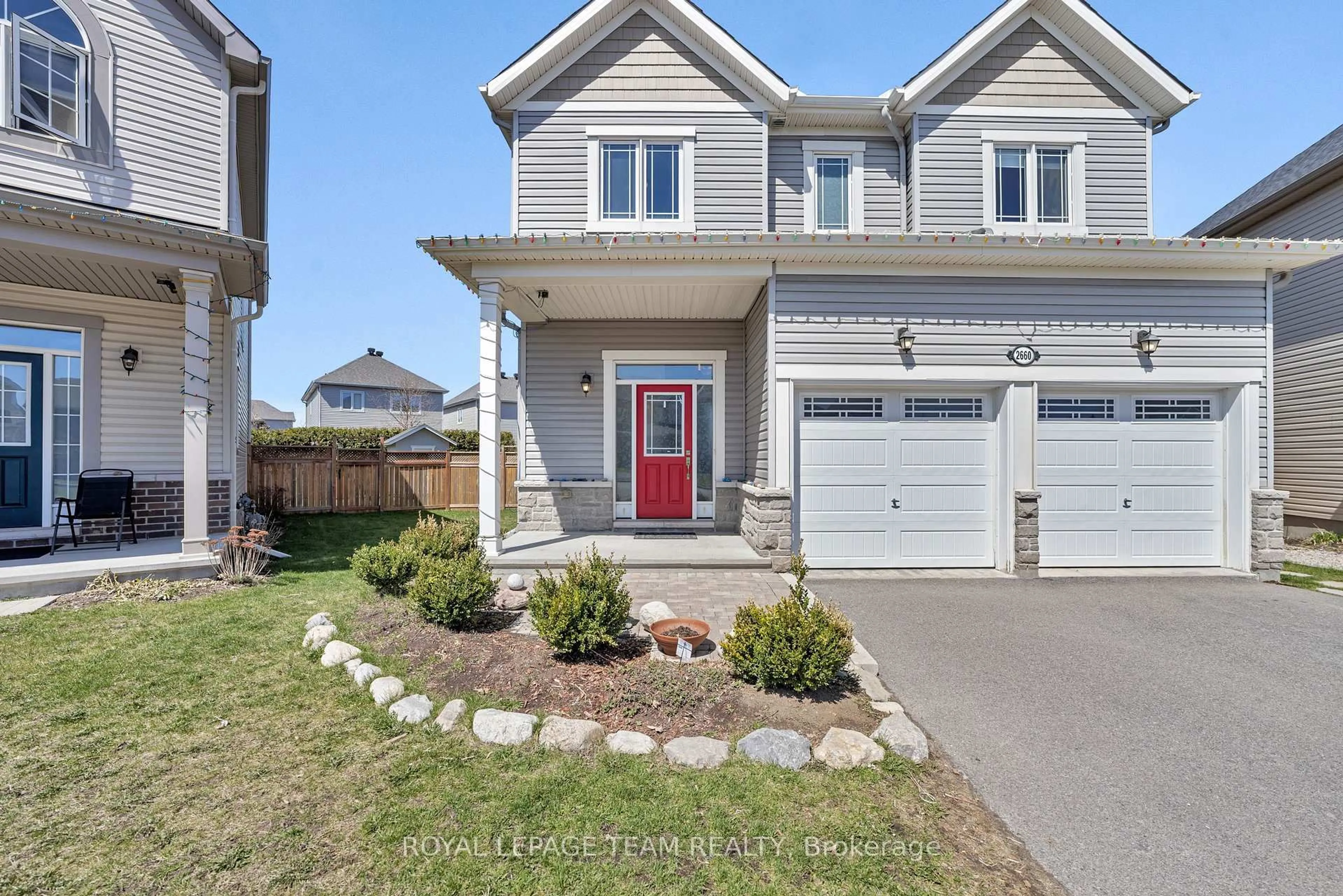 Home with vinyl exterior material, street for 2660 Tempo Dr, North Grenville Ontario K0G 1J0