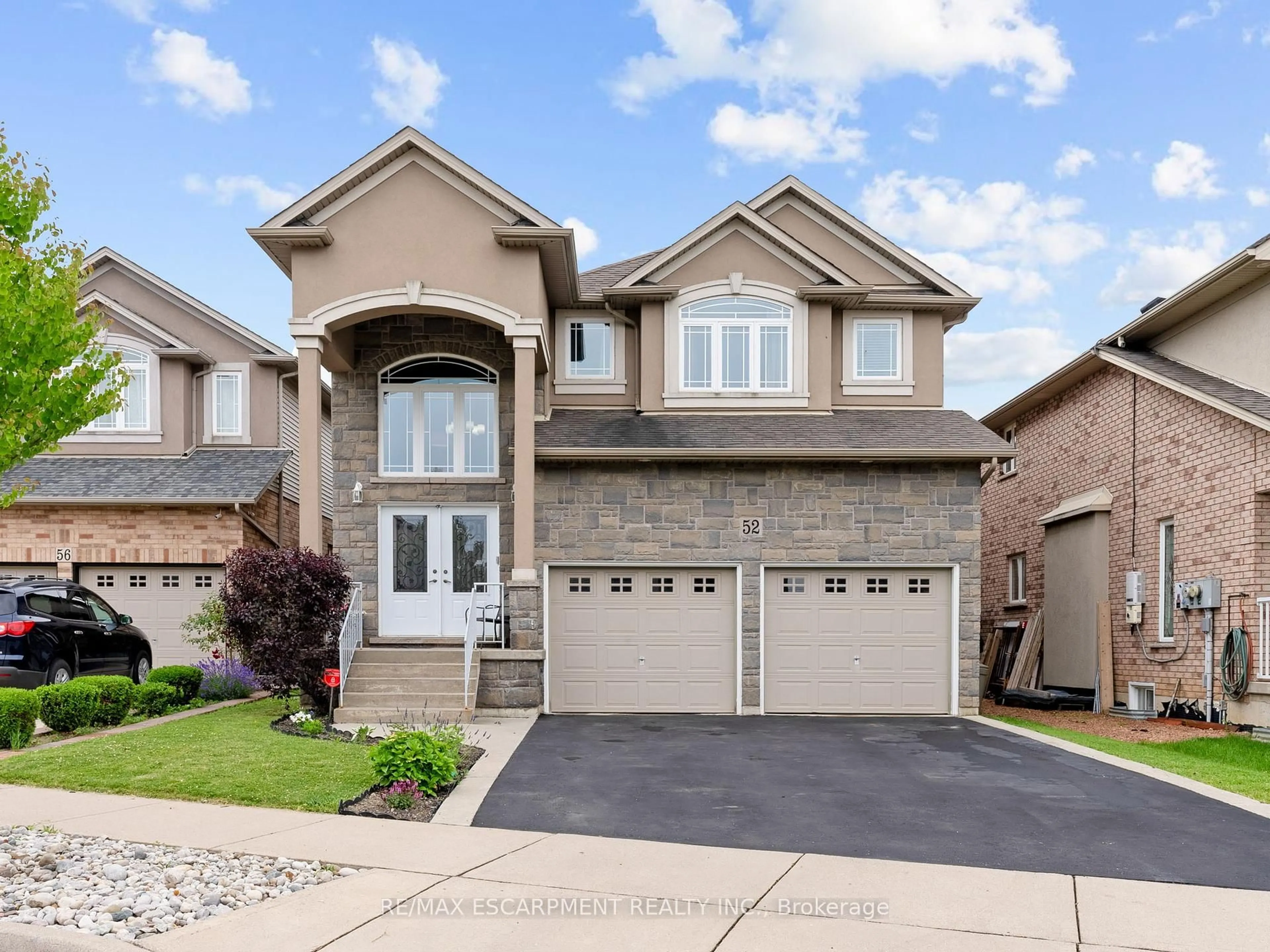 Home with brick exterior material, street for 52 Arrowhead Dr, Hamilton Ontario L8W 3X2