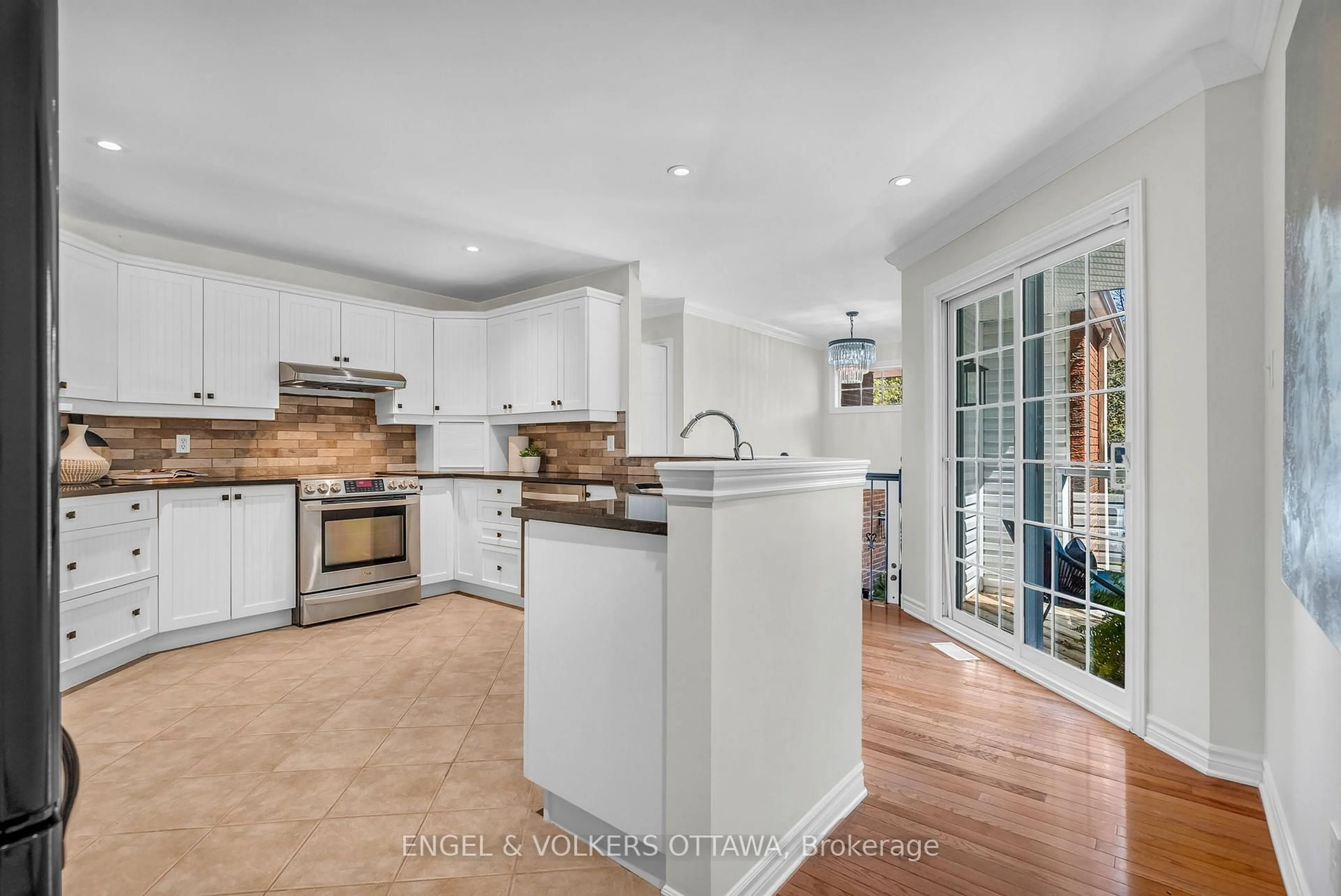 Open concept kitchen, ceramic/tile floor for 7359 Marcella Dr, Ottawa Ontario K4P 1P7