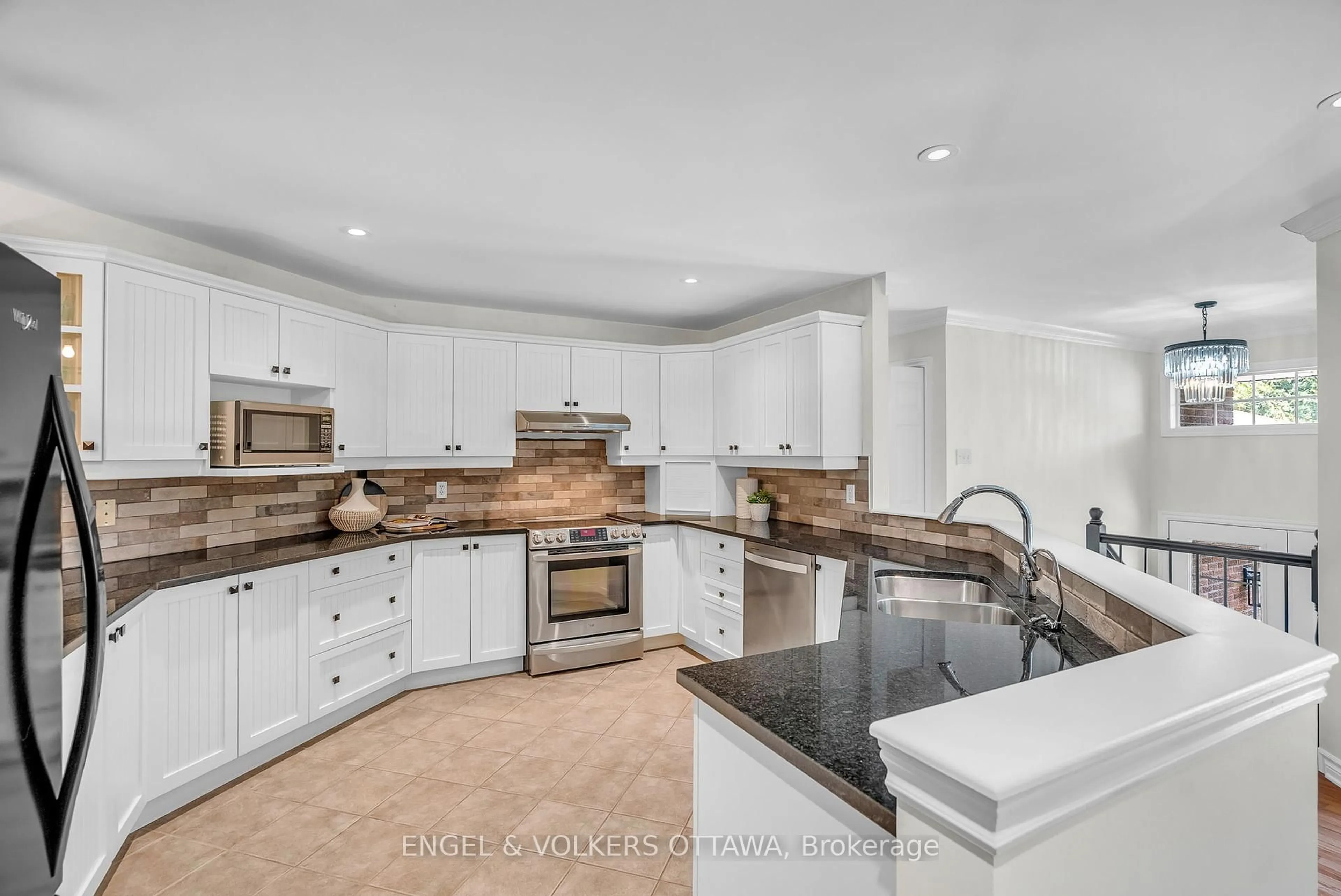 Open concept kitchen, ceramic/tile floor for 7359 Marcella Dr, Ottawa Ontario K4P 1P7
