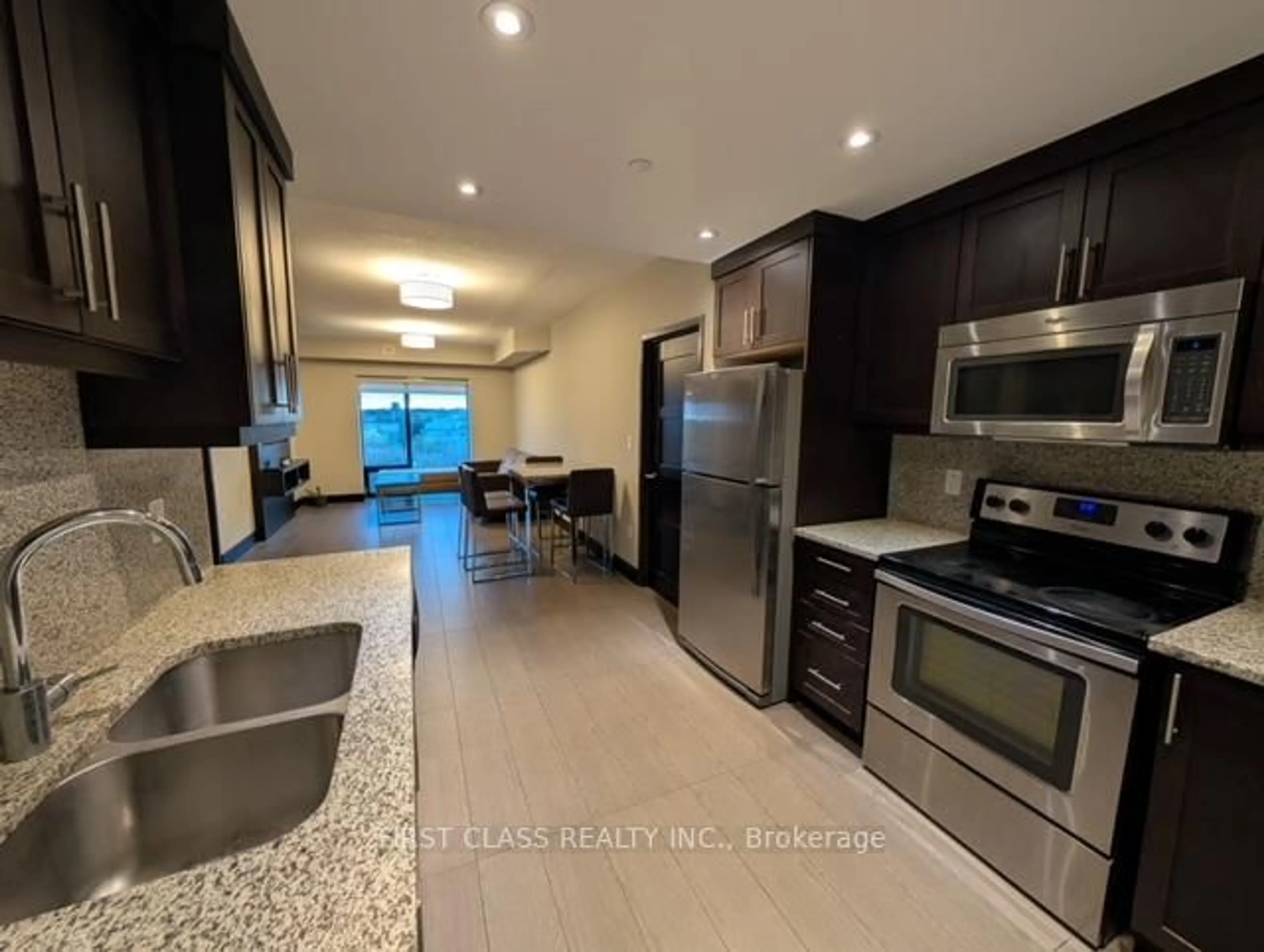 Open concept kitchen, ceramic/tile floor for 1235 Richmond St #1307, London Ontario N6A 0C1