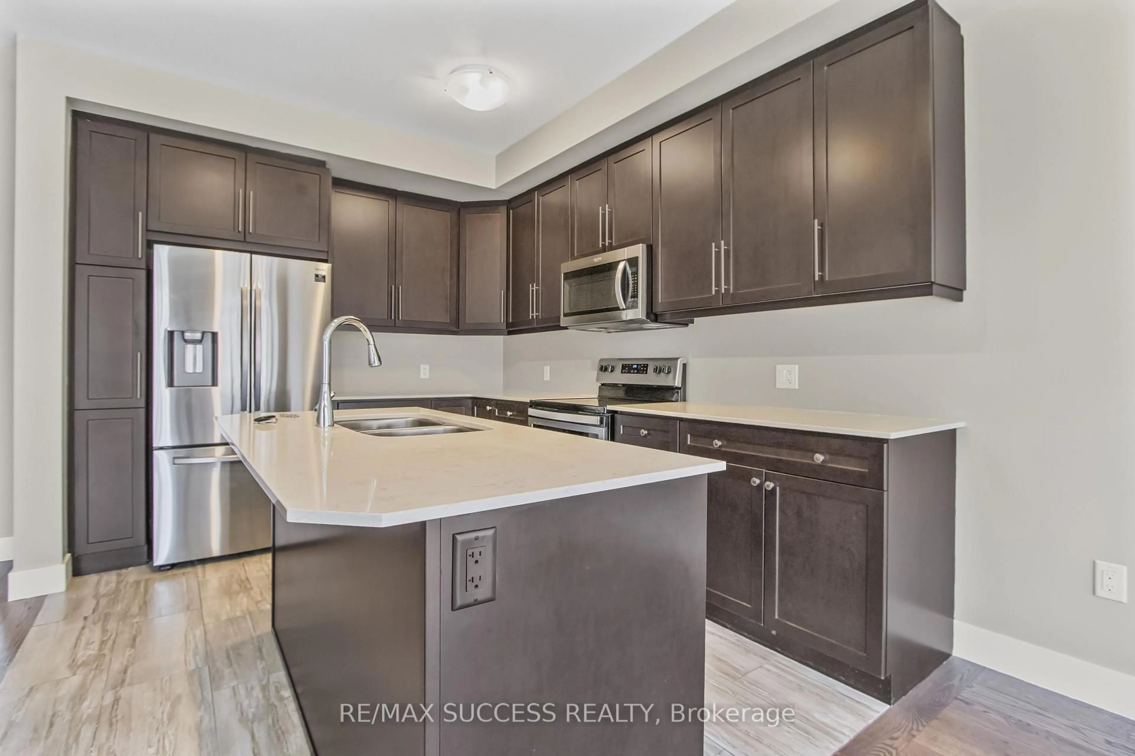 Open concept kitchen, ceramic/tile floor for 1960 DALMAGARRY Rd #85, London Ontario N6G 0T8