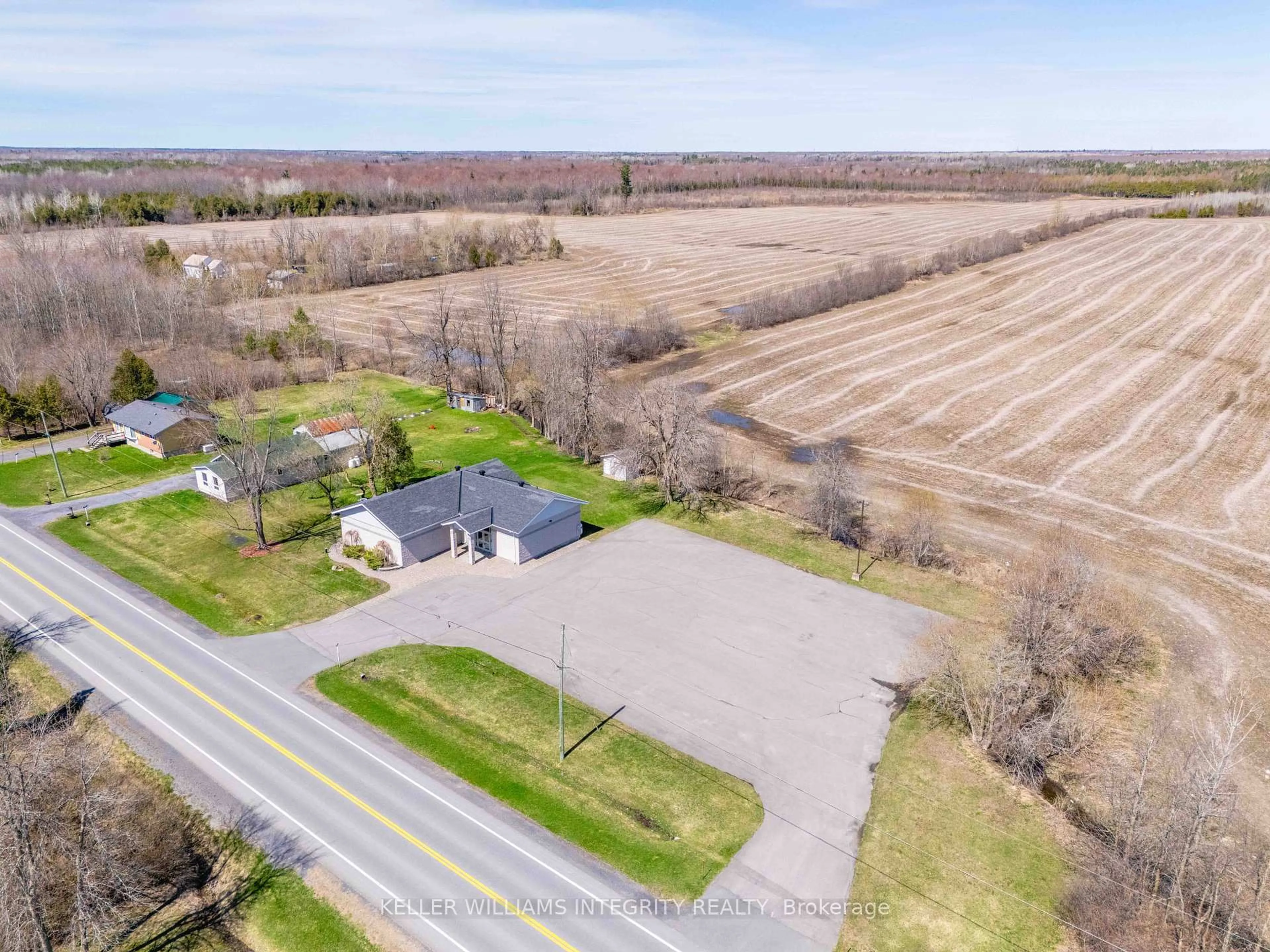 A pic from outside/outdoor area/front of a property/back of a property/a pic from drone, water/lake/river/ocean view for 14233 County Rd 18 Rd, South Stormont Ontario K0C 1M0
