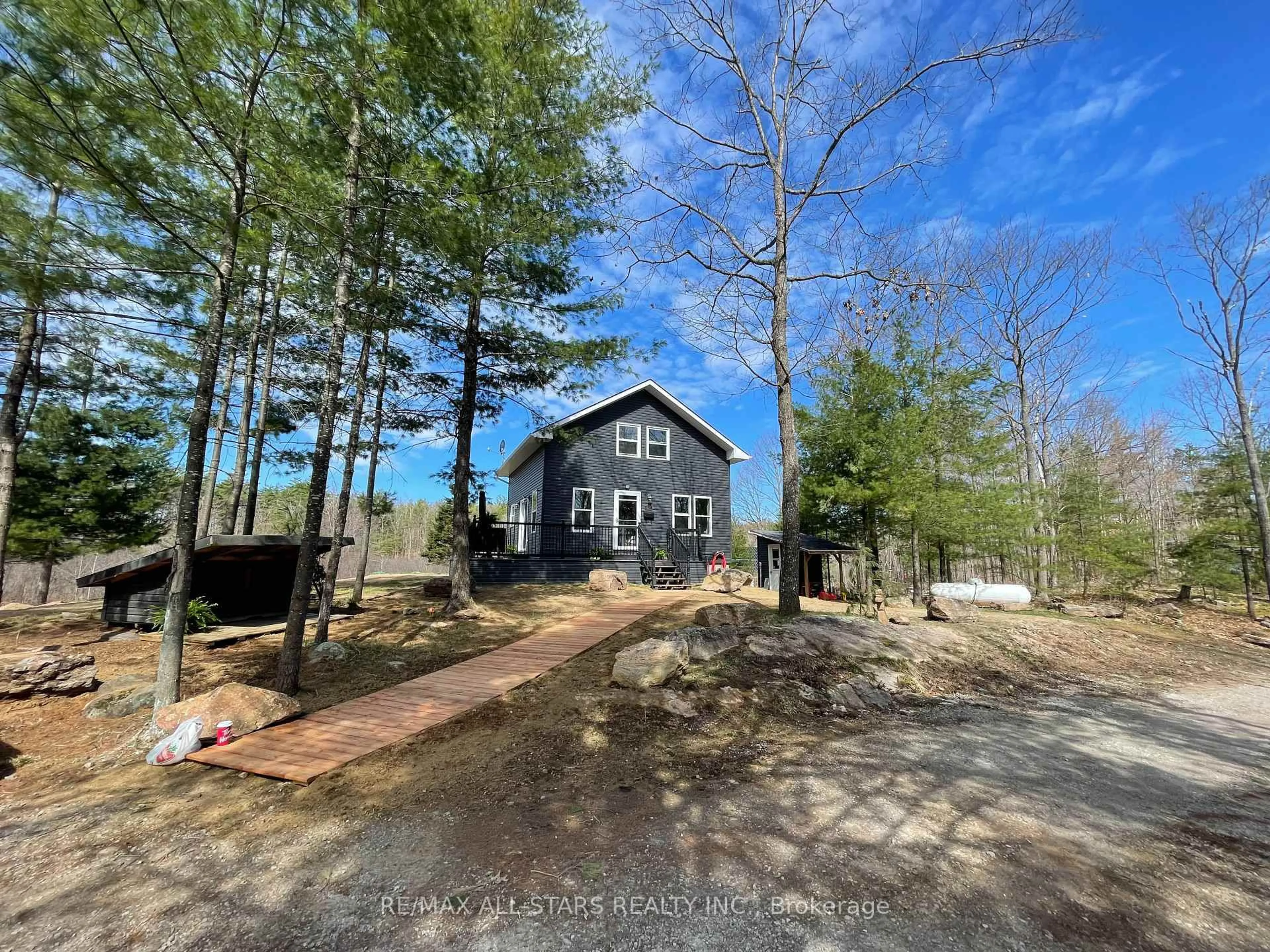 A pic from outside/outdoor area/front of a property/back of a property/a pic from drone, unknown for 1295 Deep Bay Rd, Minden Hills Ontario K0M 2L0