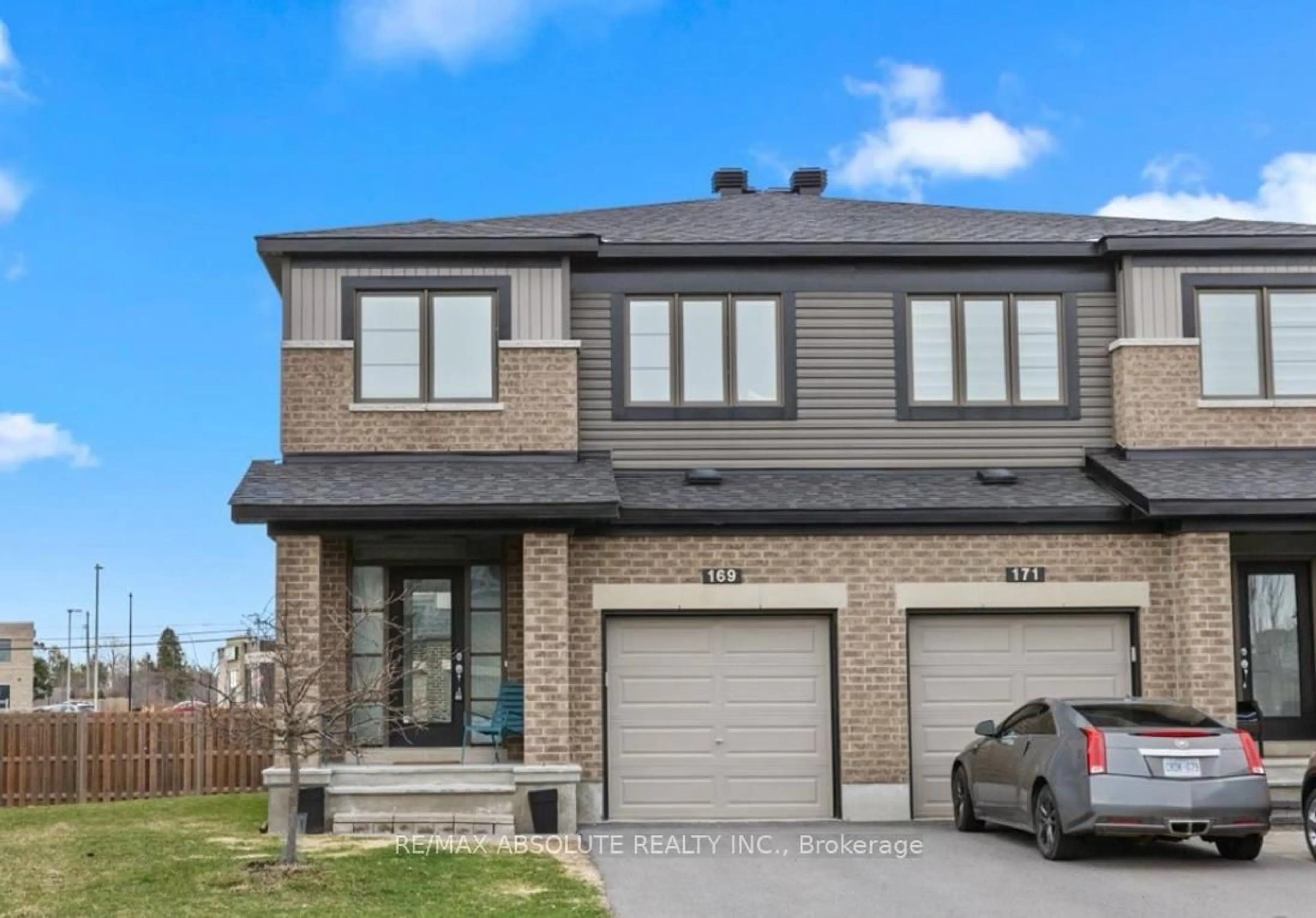 Home with brick exterior material, street for 169 Bandelier Way, Ottawa Ontario K2S 2J5