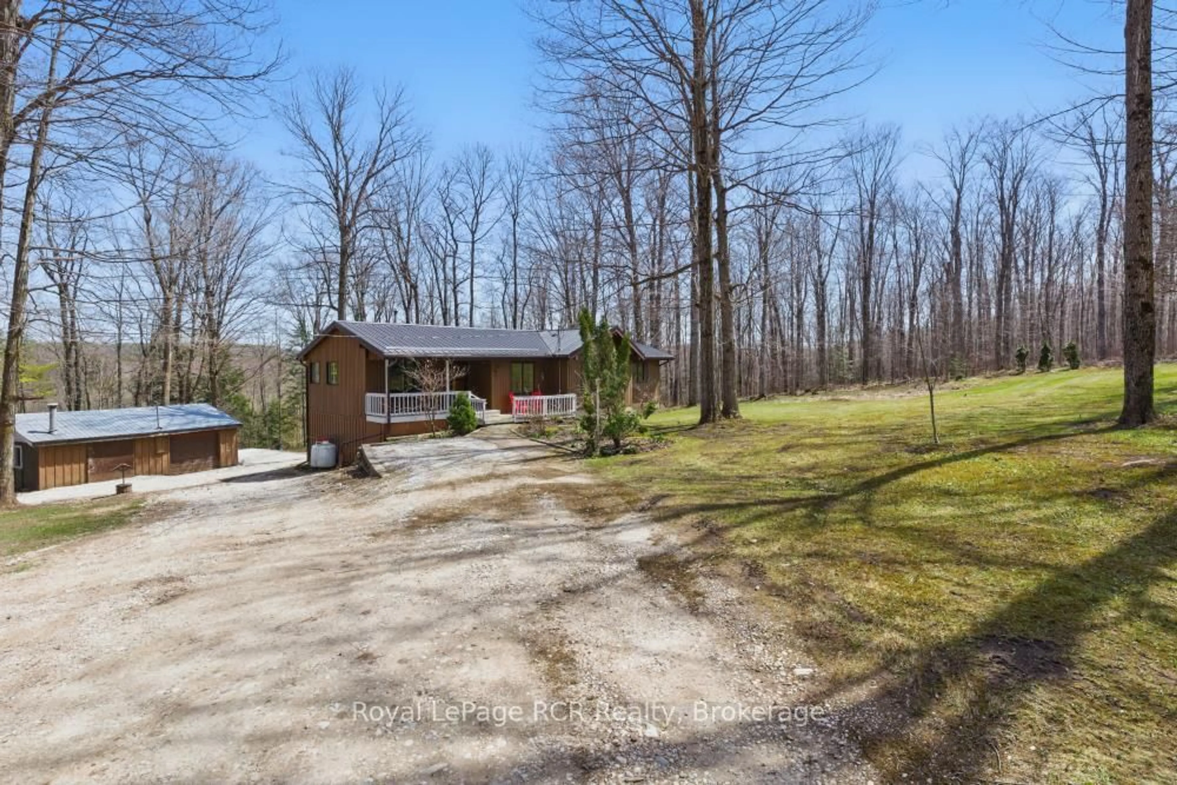 A pic from outside/outdoor area/front of a property/back of a property/a pic from drone, unknown for 214333 Baseline Rd, West Grey Ontario N0G 1S0