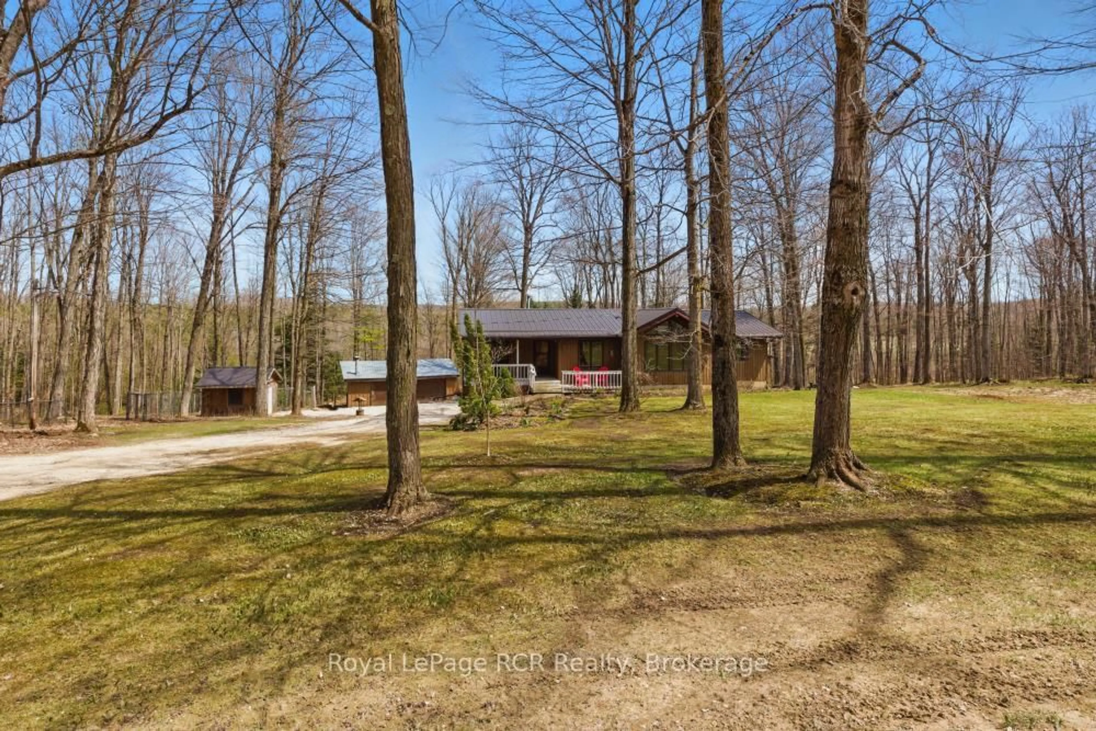 A pic from outside/outdoor area/front of a property/back of a property/a pic from drone, forest/trees view for 214333 Baseline Rd, West Grey Ontario N0G 1S0