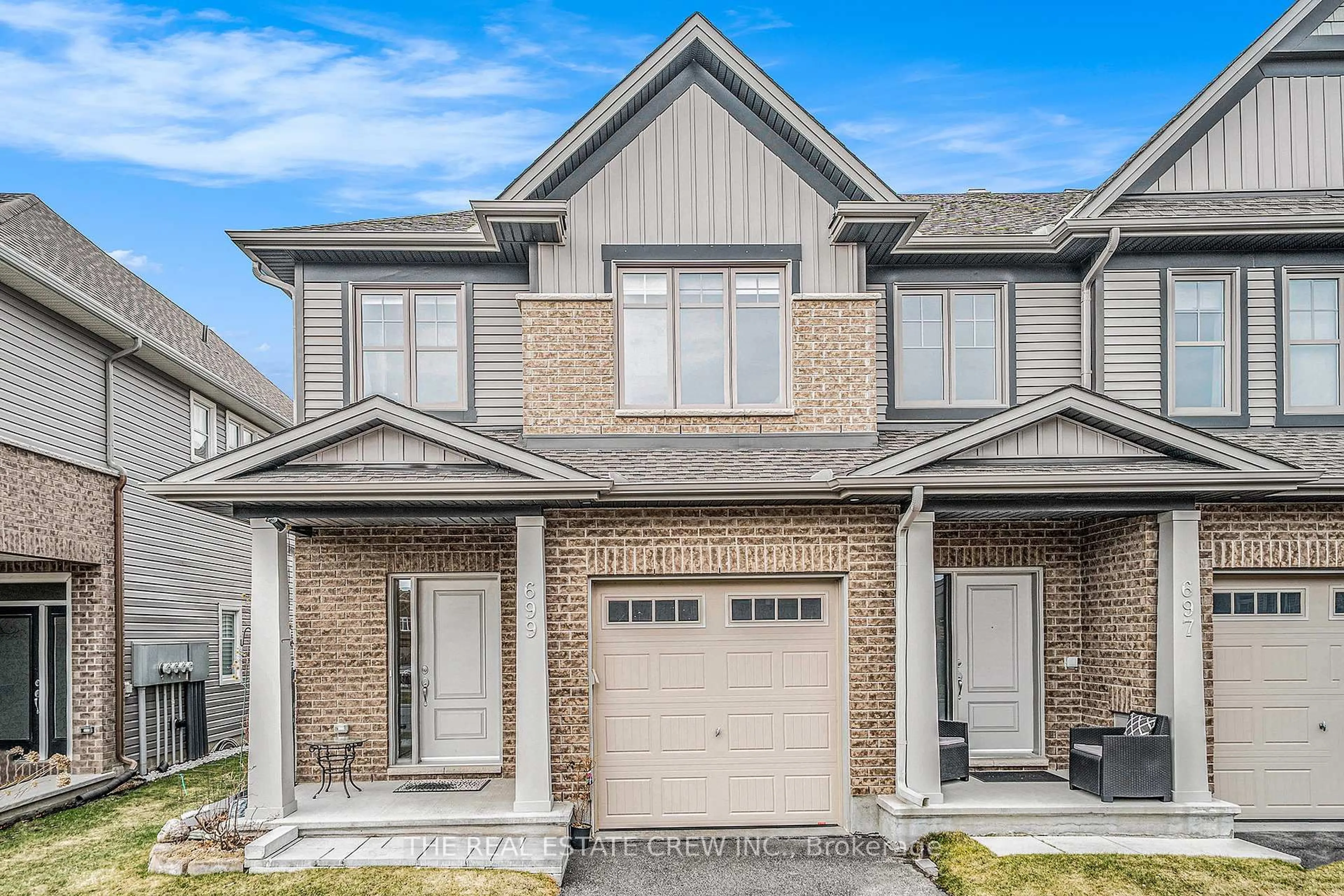 Home with brick exterior material, street for 699 Sora Way, Ottawa Ontario K1T 0R3