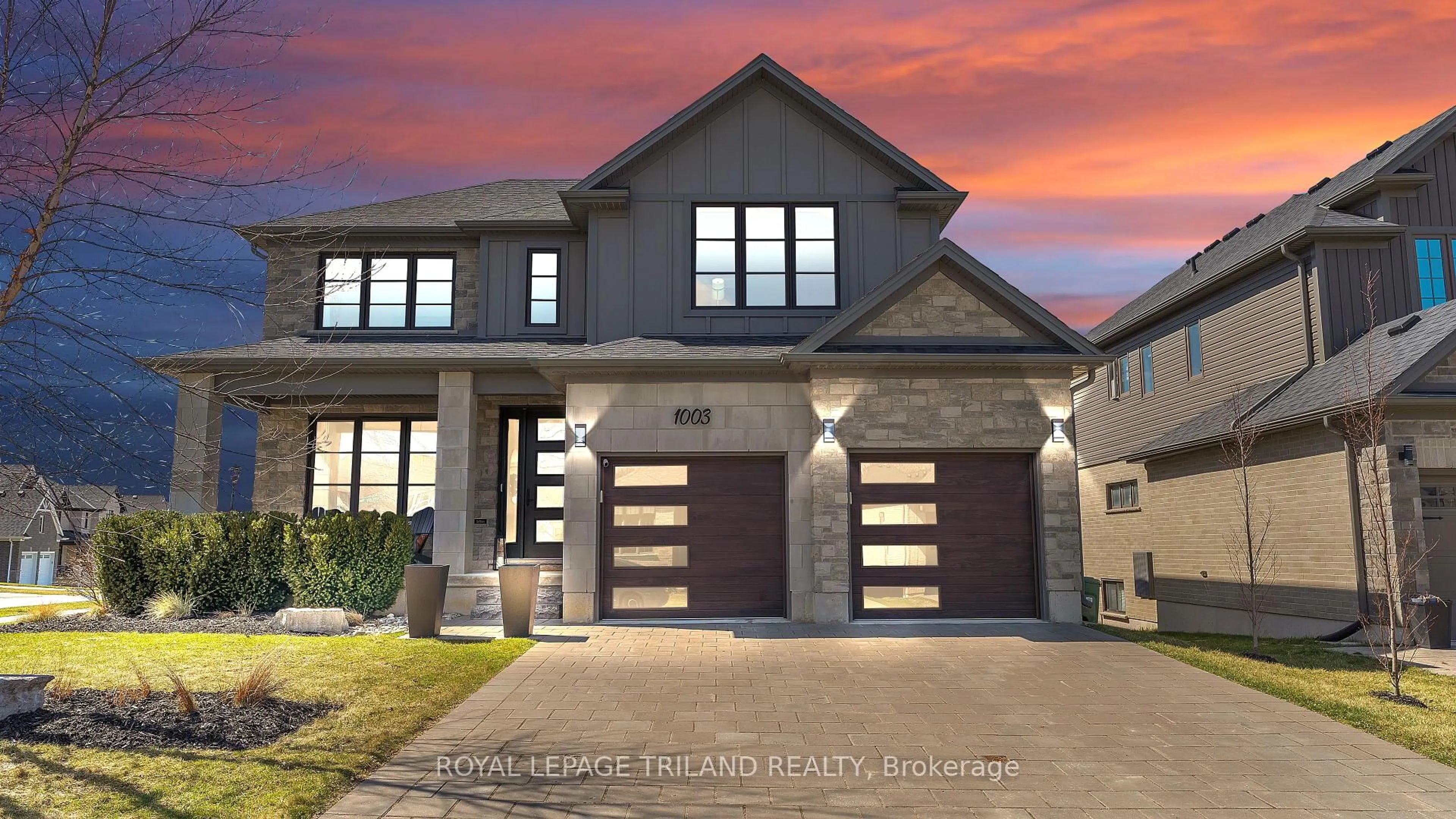 Home with brick exterior material, street for 1003 Trailsway Ave, London South Ontario N6K 0J3