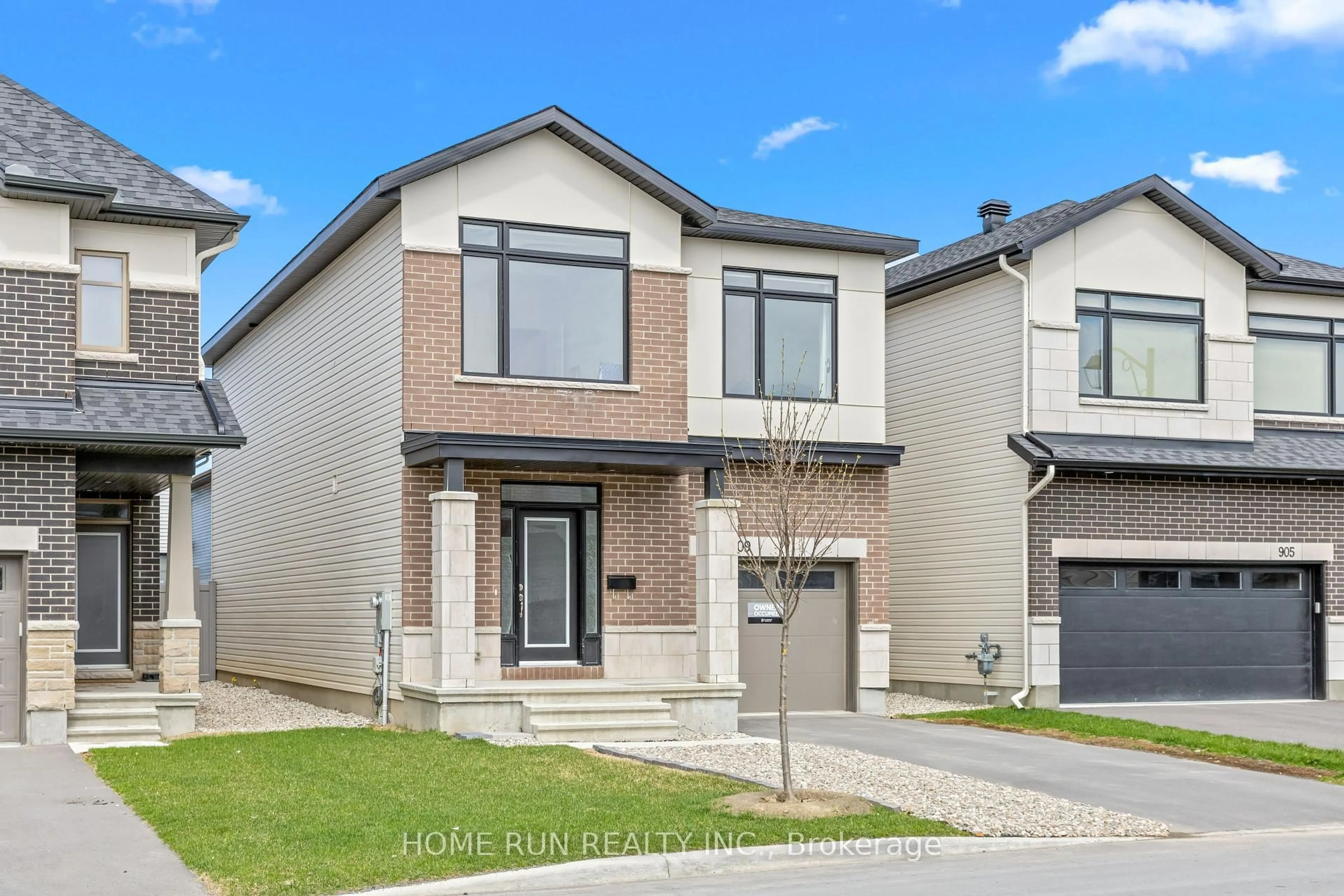 Home with brick exterior material, street for 909 Beckton Hts, Ottawa Ontario K2S 2X5