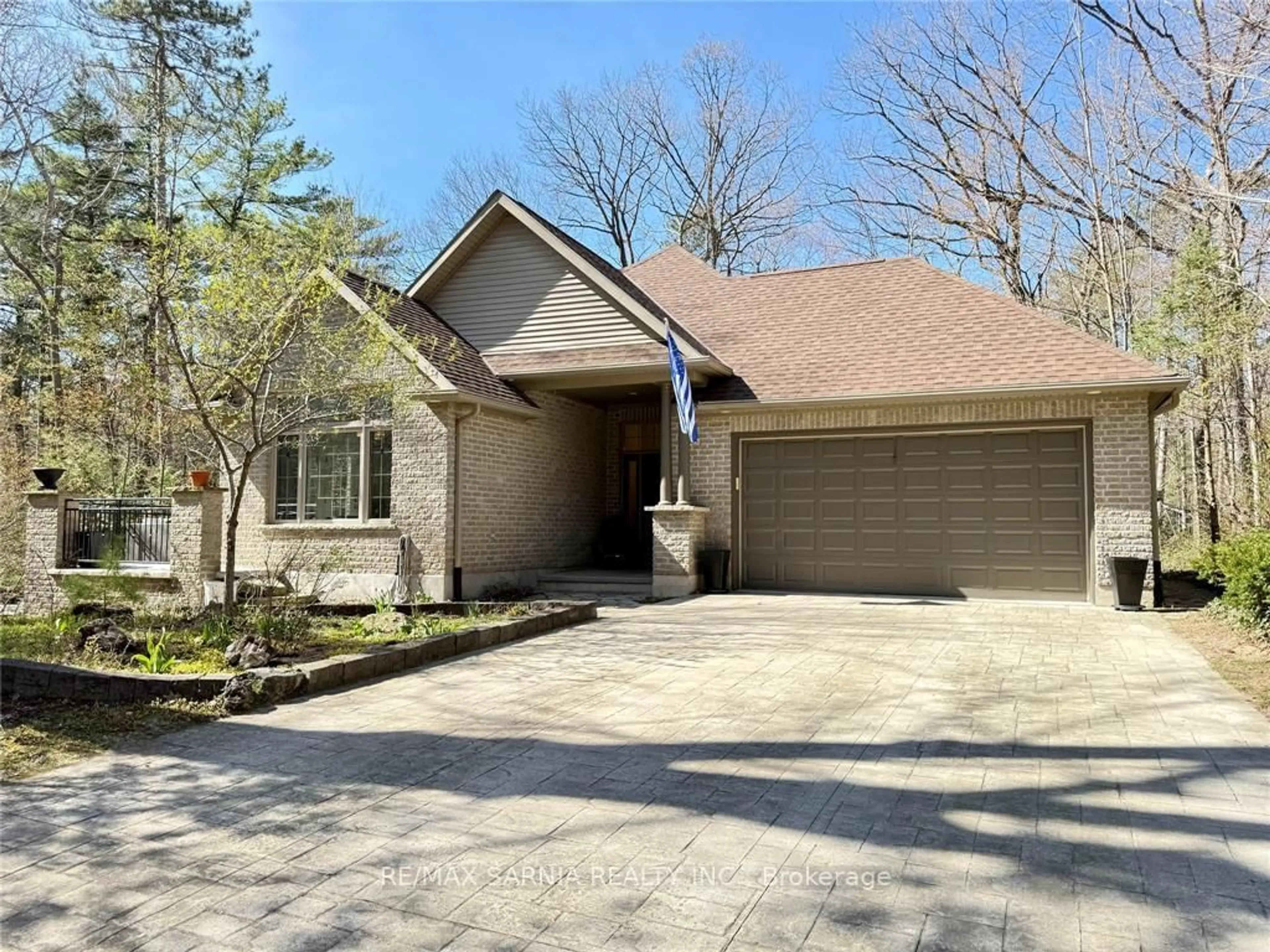 Home with brick exterior material, street for 10216 Parkside Cres, Lambton Shores Ontario N0M 1T0